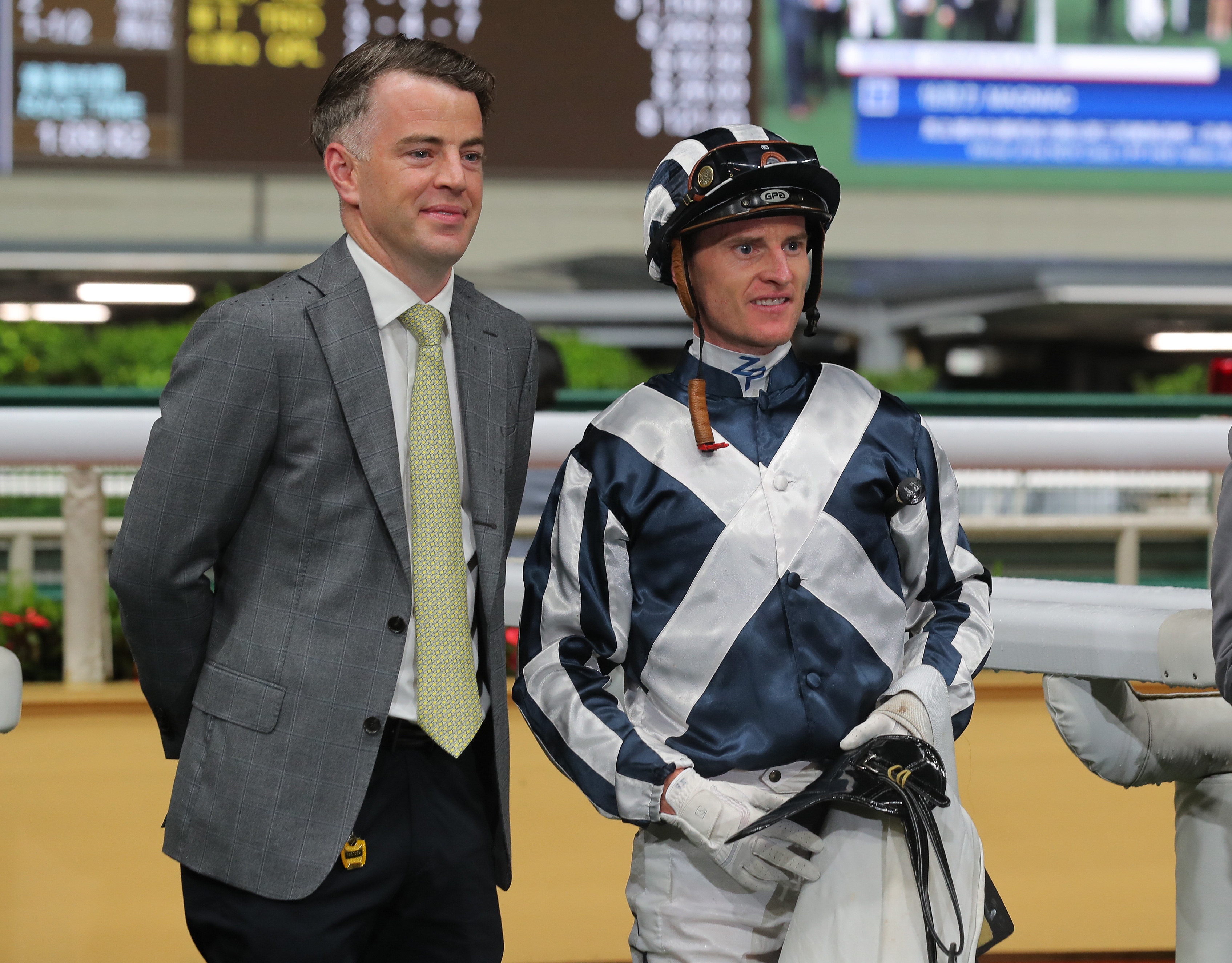 Jamie Richards and Zac Purton celebrate Australian import Magniac’s first Hong Kong win at Happy Valley on April 19. Photo: Kenneth Chan