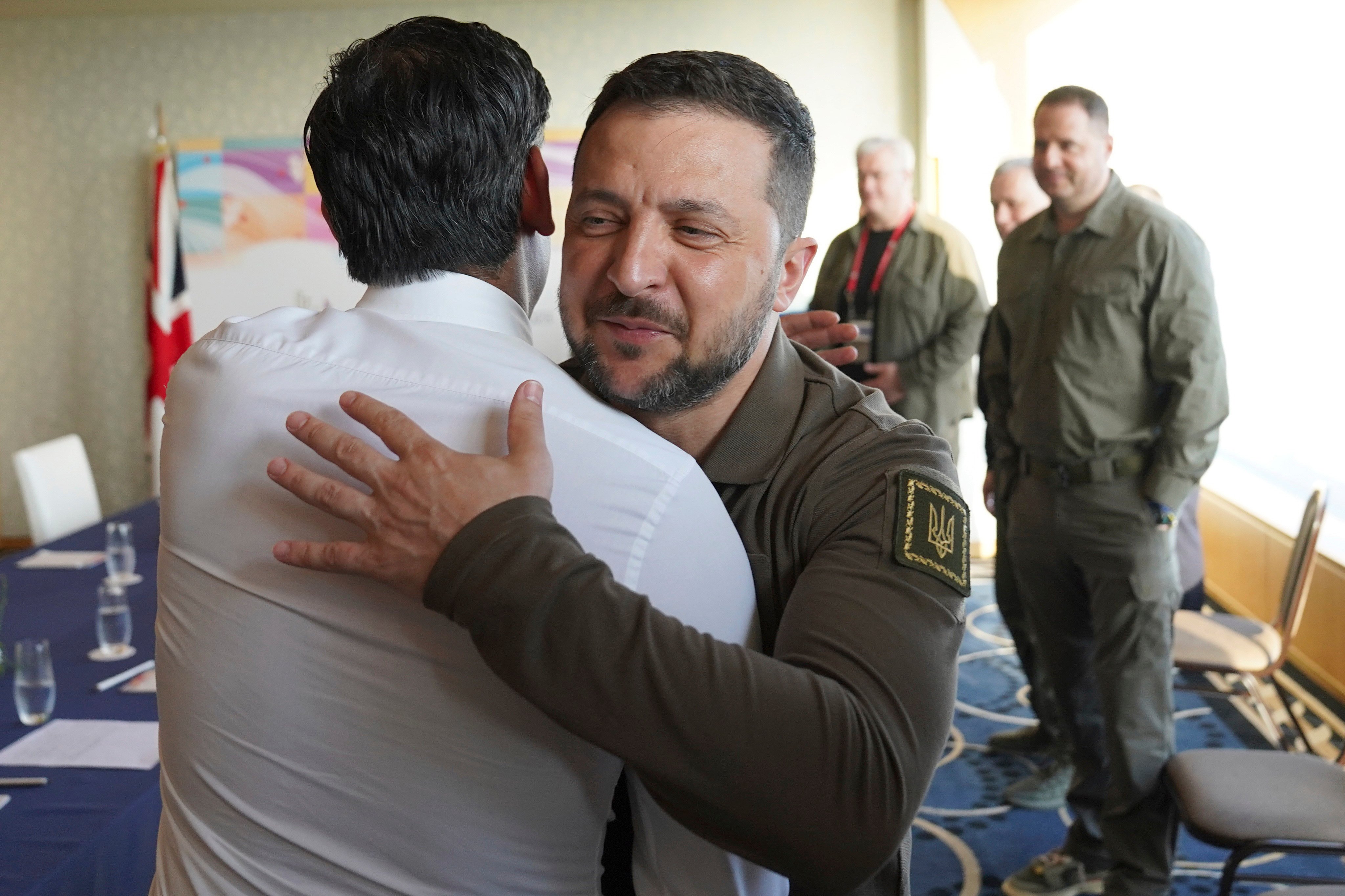 Ukraine President Volodymyr Zelensky and Britain’s Prime Minister Rishi Sunak embrace in Hiroshima, Japan. Zelensky held meetings with several world leaders. Photo: AP