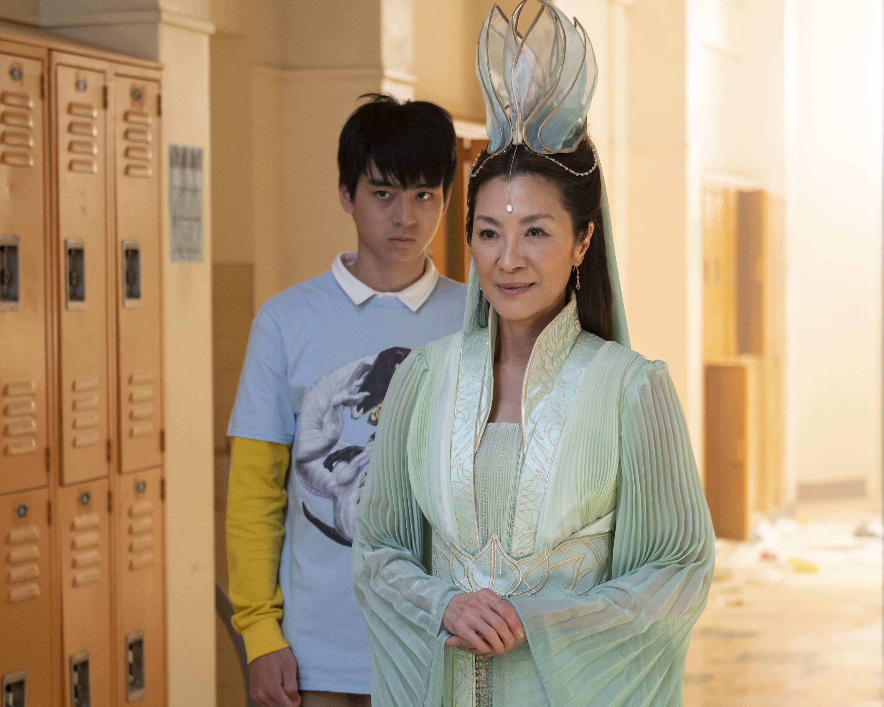 Michelle Yeoh as Guanyin (front) and Ben Wang as student Jin Wang in a still from Disney+’s “American Born Chinese”. Photo: Disney+