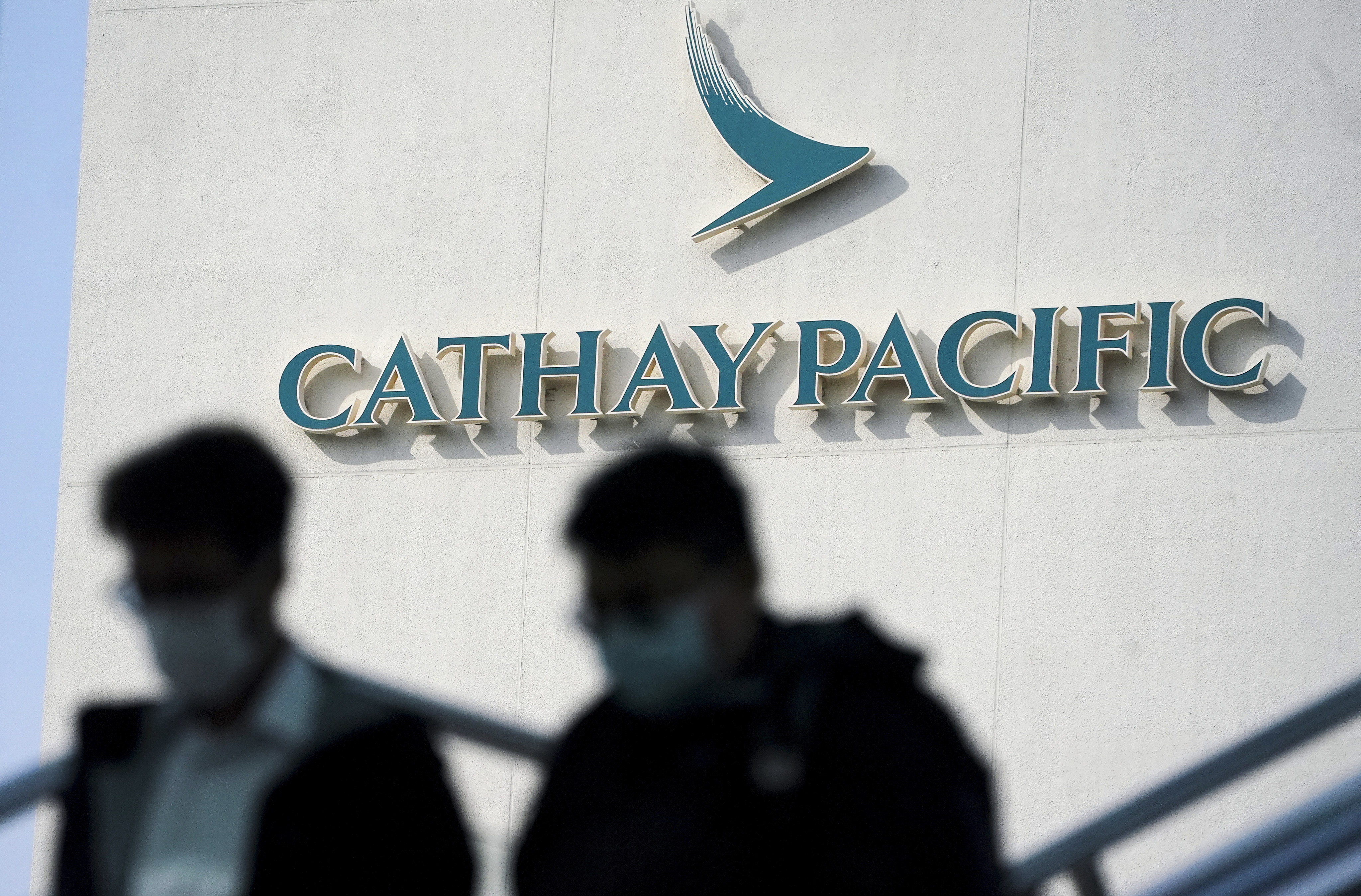 Cathay Pacific has fired three cabin crew members after complaints emerged of staff insulting passengers. Photo: Felix Wong