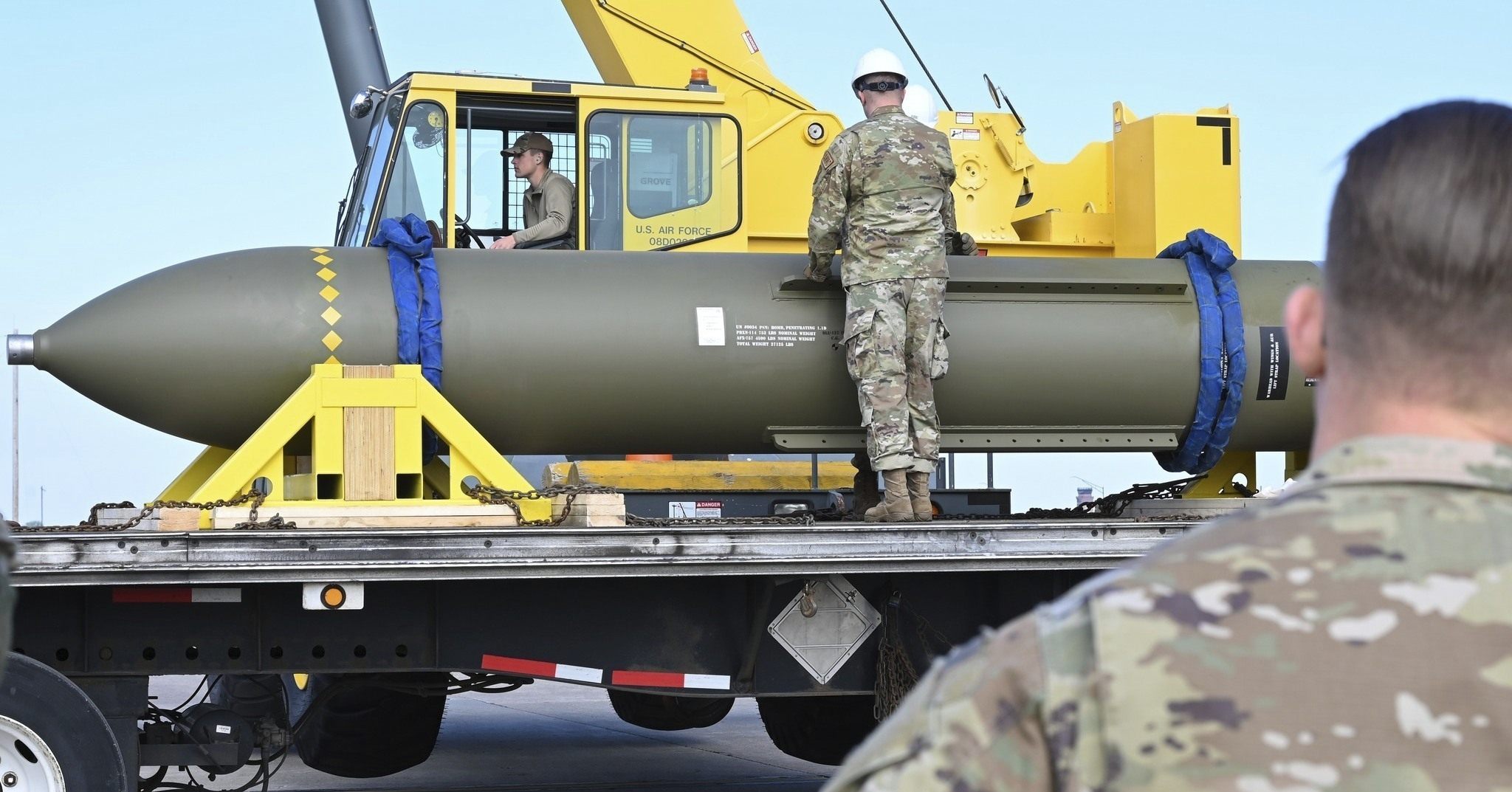 In this photo released by the US Air Force on May 2, 2023, airmen look at a GBU-57 bomb at Whiteman Air Base in Missouri. Photo: US Air Force via AP