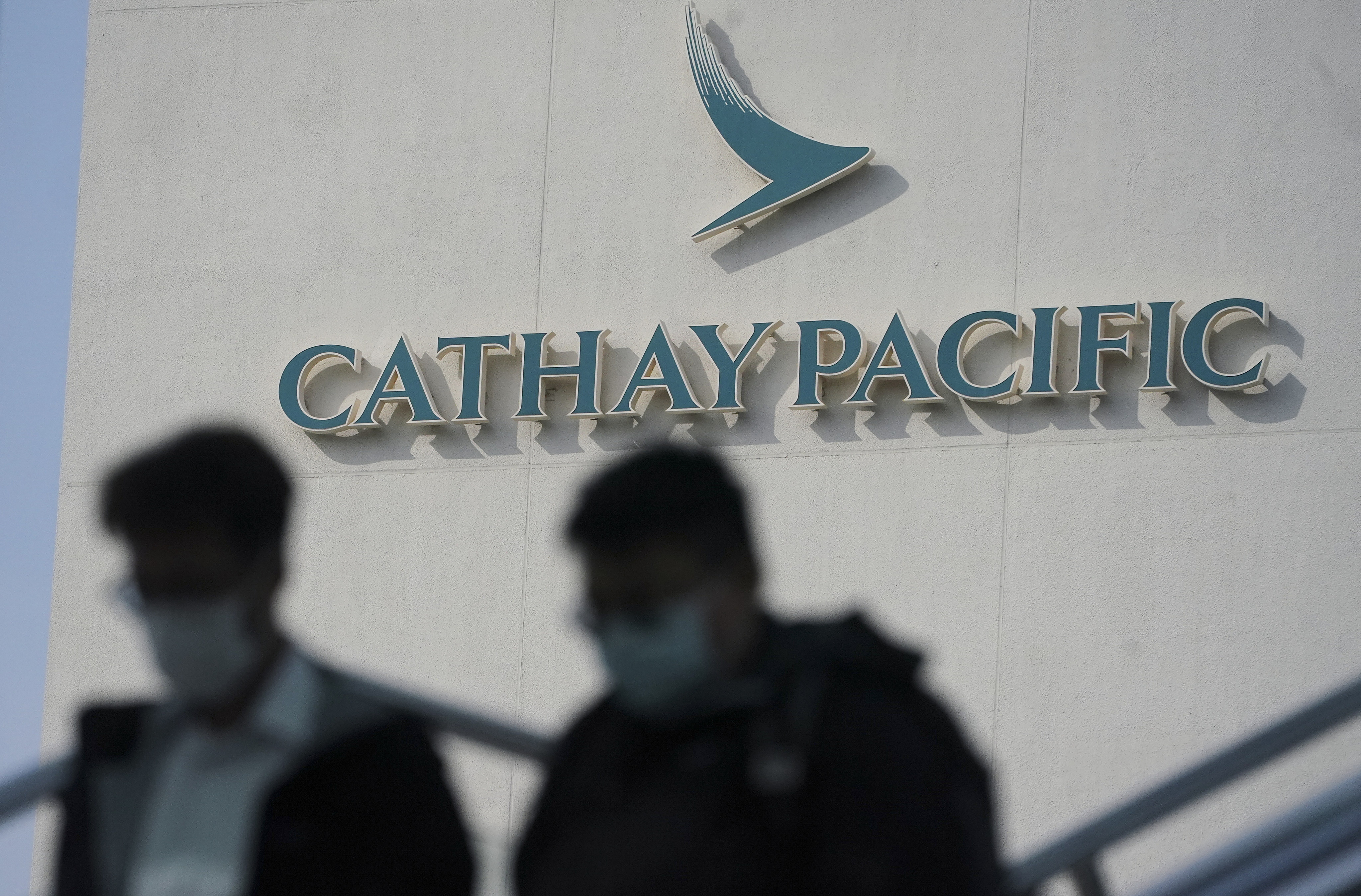 Cathay Pacific has fired three cabin crew members after complaints emerged of staff insulting passengers. Photo: Felix Wong