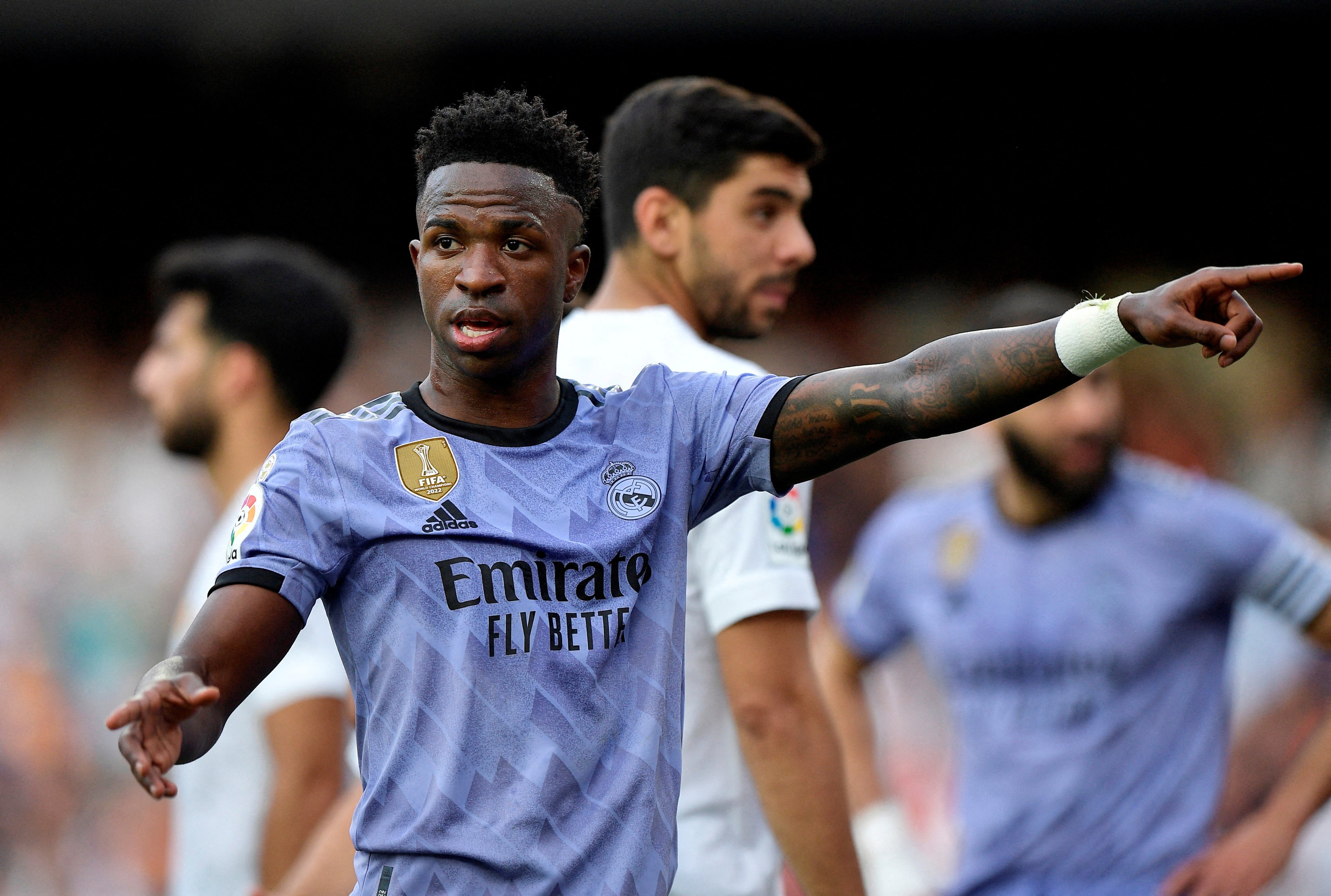 Real Madrid’s Vinicius Junior gestures towards a fan abusing him in the stands at Valencia. Photo: Reuters