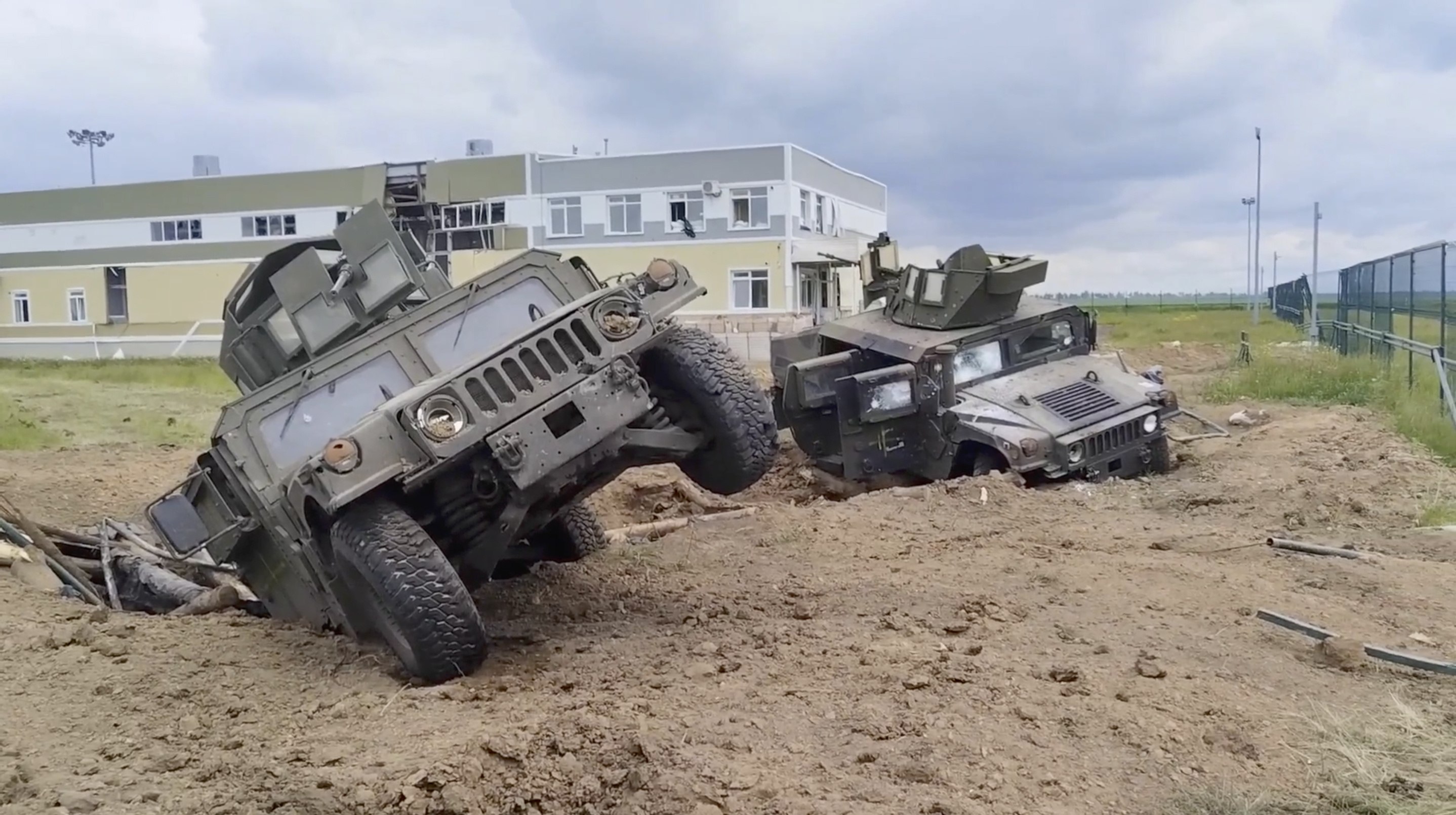 Destroyed armoured vehicles that look like US-made Humvees in the Grayvoronsky district of Belgorod region, Russia. Photo: Russian Defence Ministry via EPA-EFE