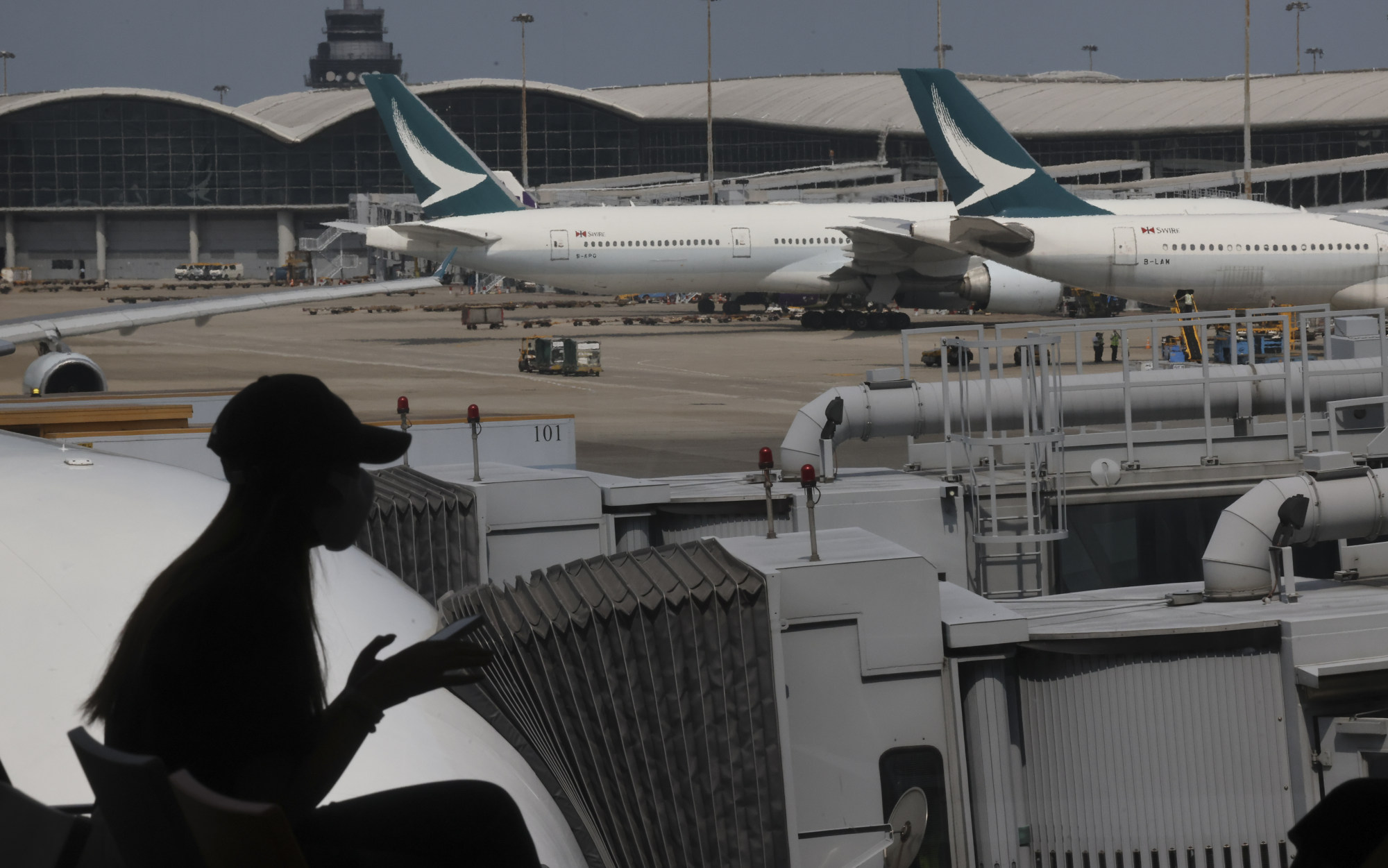 Cadet pilot graduates will spend up to two months at Hong Kong’s airport for duties such as customer training. Photo: Jonathan Wong