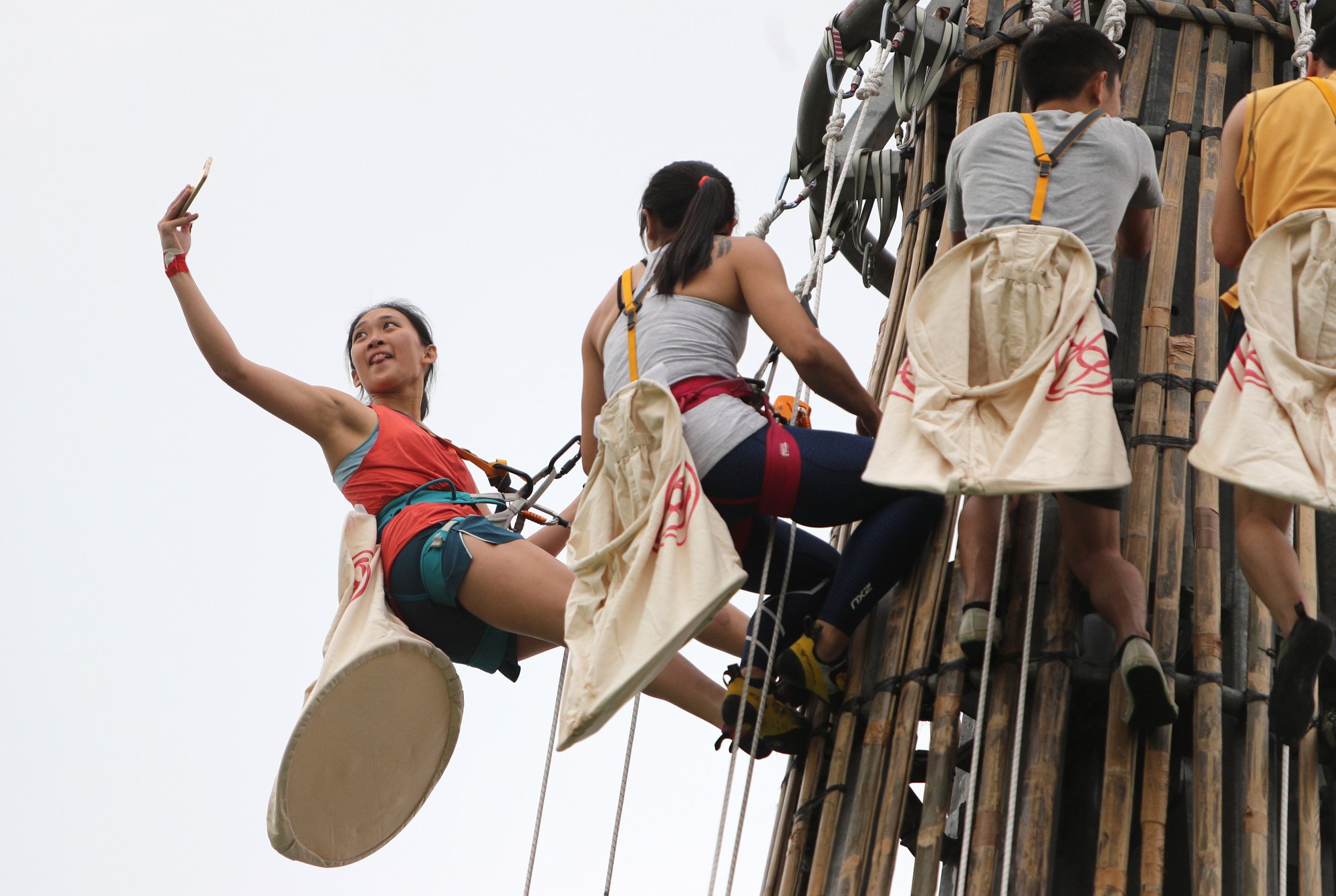 Janet Kung taking a selfie on one of the towers built for the 2019 edition. Photo: Winson Wong