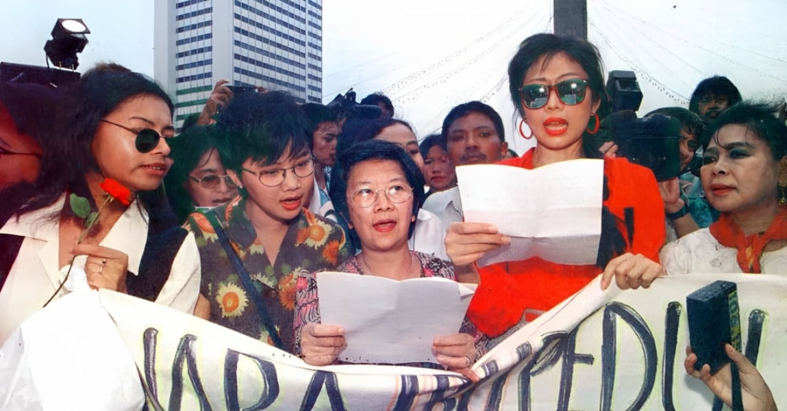 Julia Suryakusuma, in red, at a women’s rally in 1998 in Indonesia. Photo: Handout