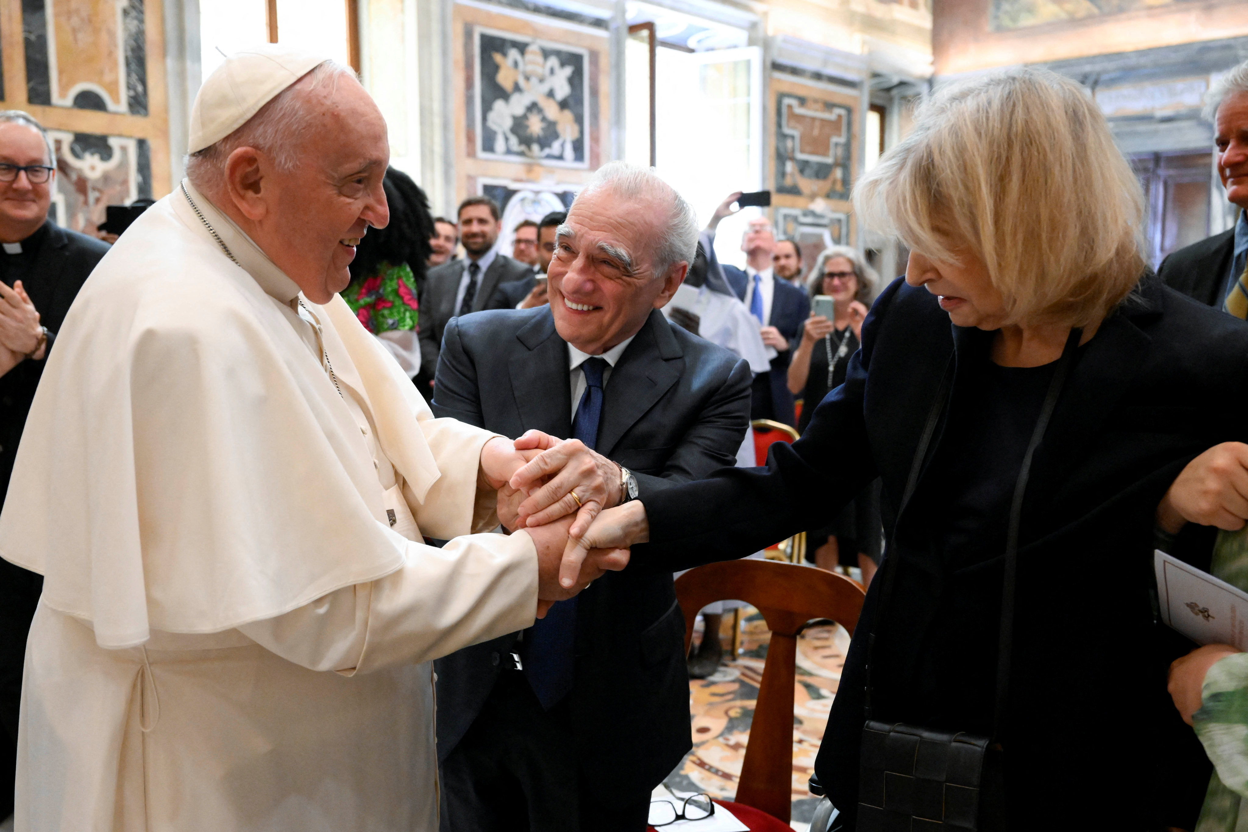 Pope Francis meets film director Martin Scorsese and his wife Helen Morris at the Vatican in Rome, Italy on Saturday. Photo:  Vatican Media / ­Handout via Reuters