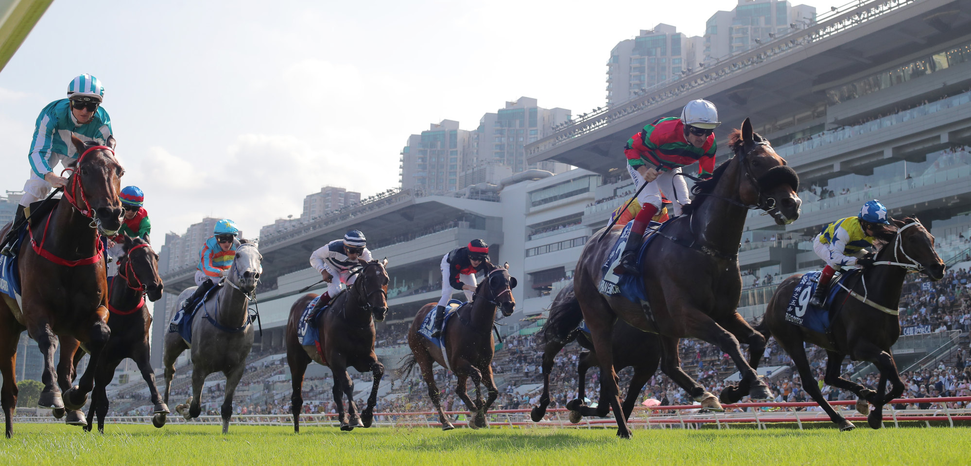 Russian Emperor (red, green and black colours) takes out the Champions & Chater Cup at Sha Tin on Sunday.