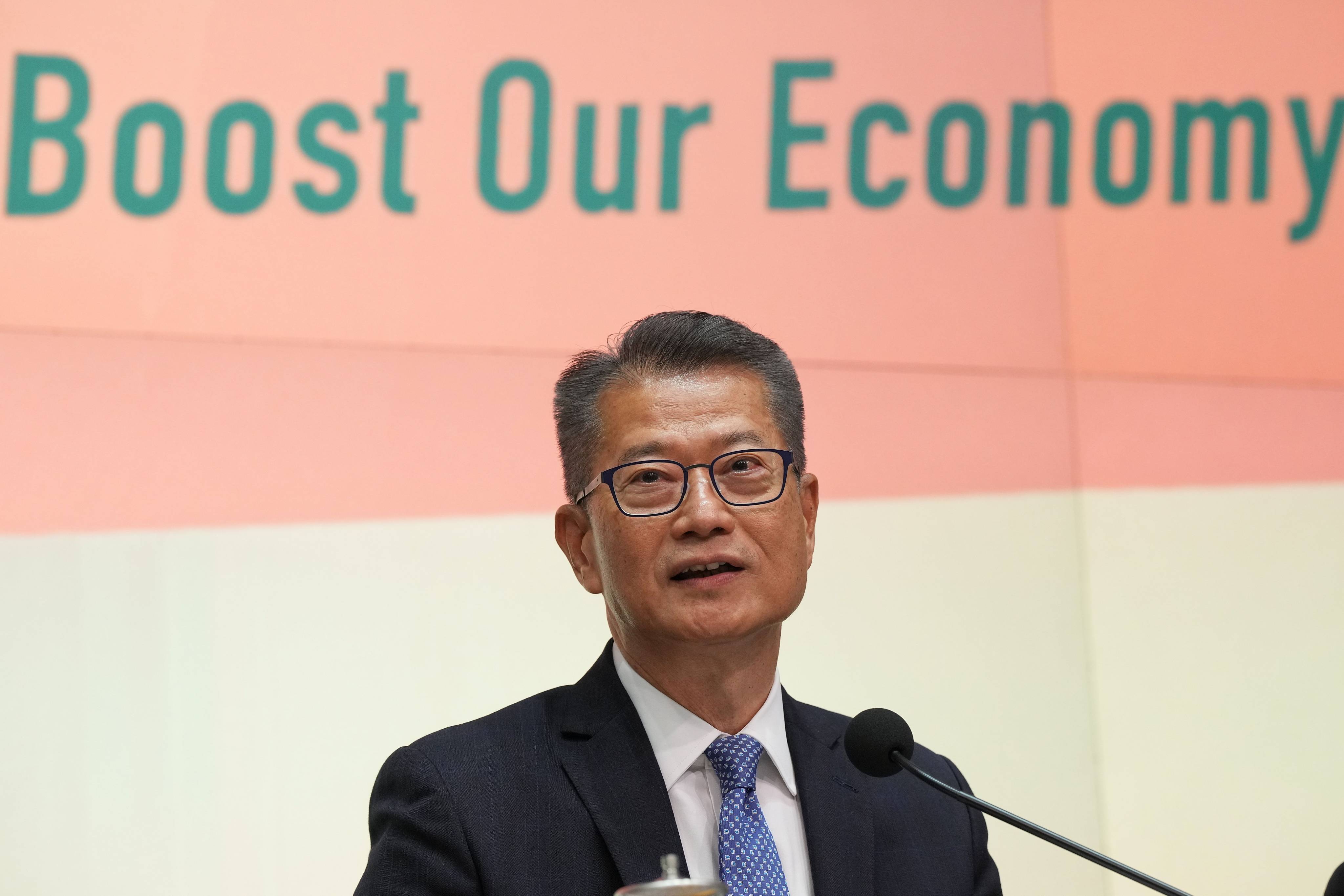 Hong Kong Finance chief Paul Chan is seen announcing the second instalment of the 2023 consumption voucher scheme Second Instalment on Monday. Photo: Elson Li