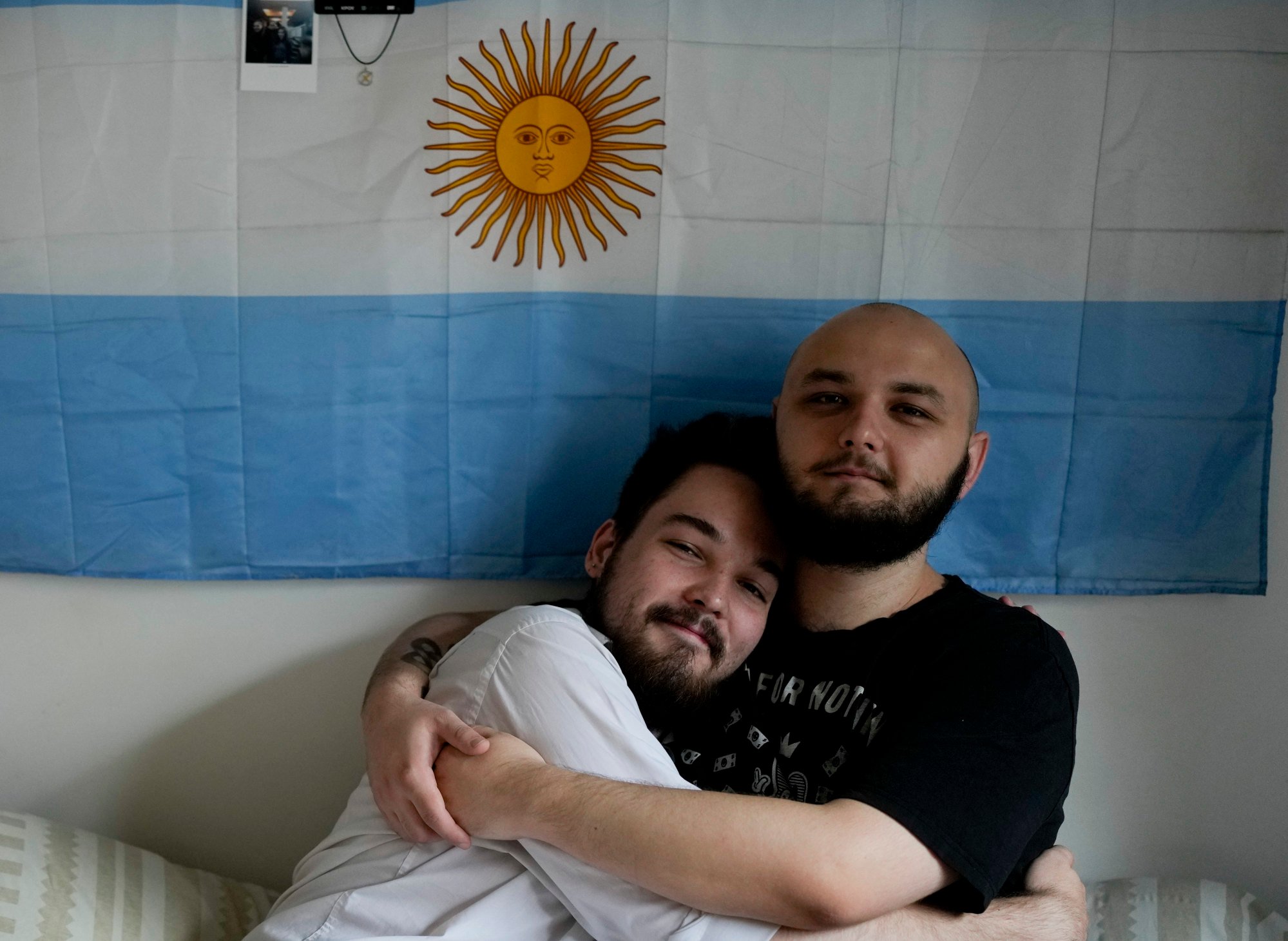 Russian nationals Dmitri Yarin, left, and his partner Nikolai Shushpan live an openly gay life in Argentina. Photo: AP