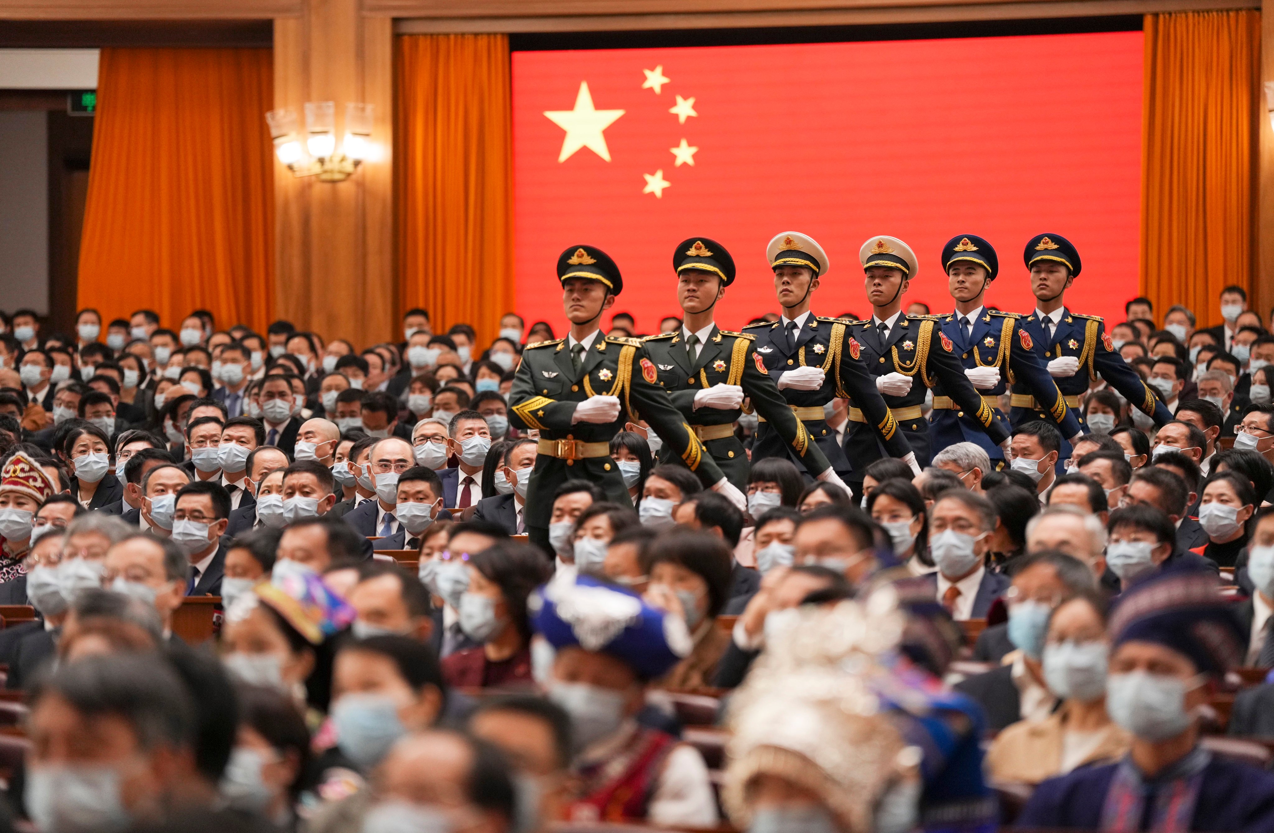 The People’s Liberation Army guard of honour march during the ceremony for newly elected Chinese leaders to pledge allegiance to the country’s constitution, at the Great Hall of the People in Beijing, on March 10. Photo: Xinhua