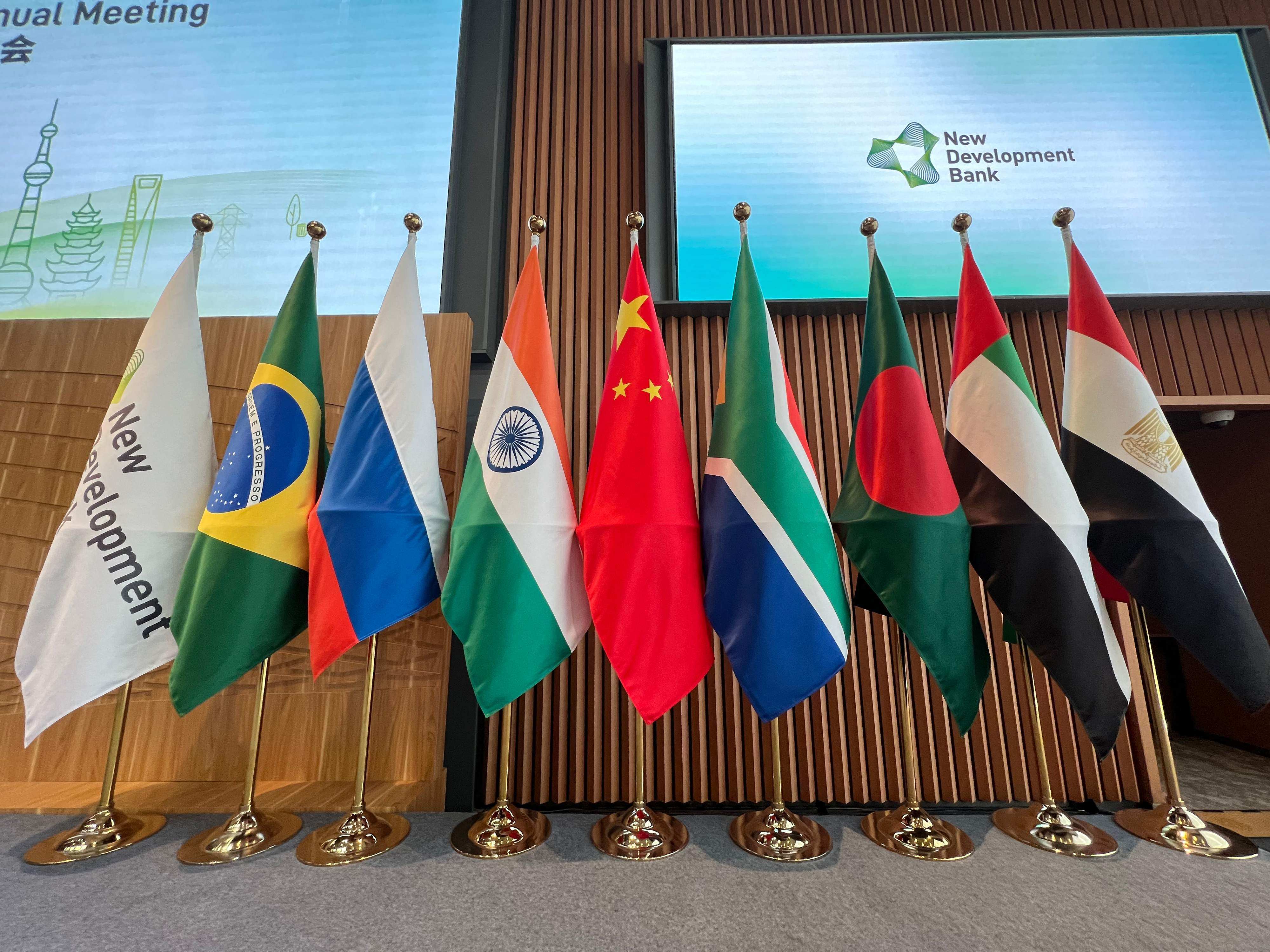 Flags on display at the opening ceremony of the New Development Bank’s annual meeting in Shanghai on May 30, 2023. Photo: AFP