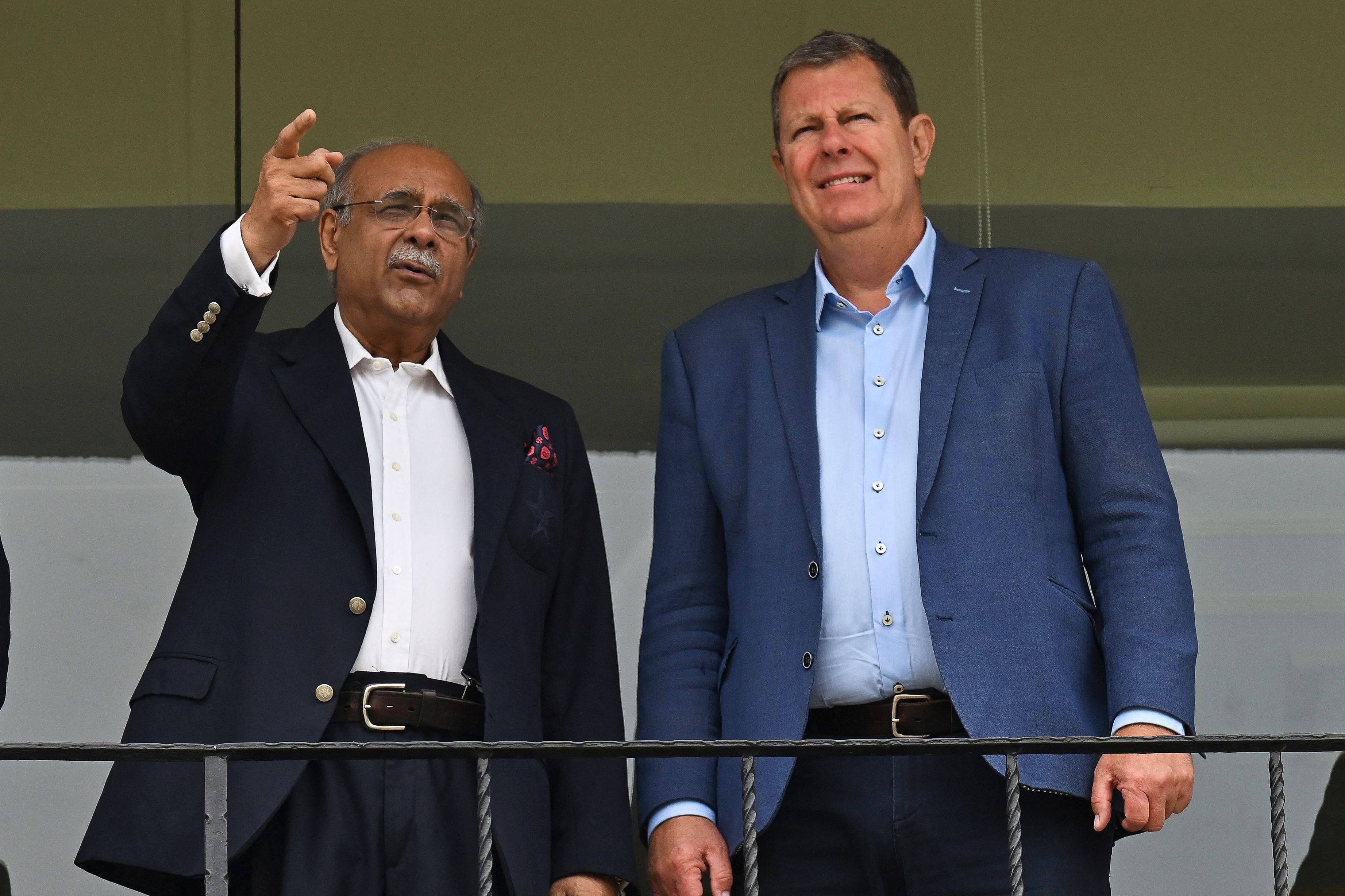 International Cricket Council (ICC) chairman Greg Barclay (right) visits the Gaddafi Stadium in Lahore along with Pakistan Cricket Board chairman Najam Sethi. Photo: AFP