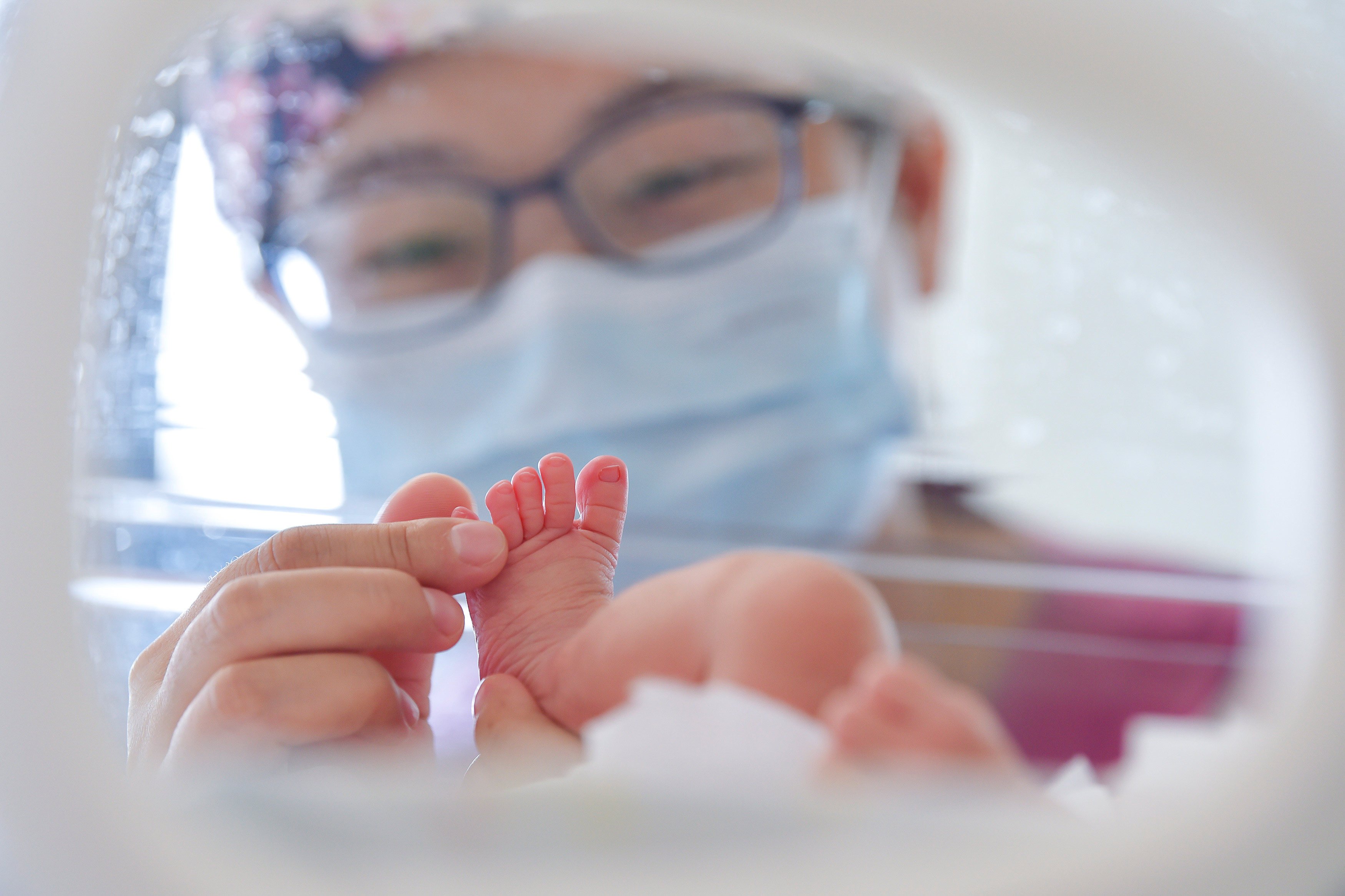 Authorities throughout China are trying to get people to have children, but incentives differ greatly across different cities. Photo: Xinhua