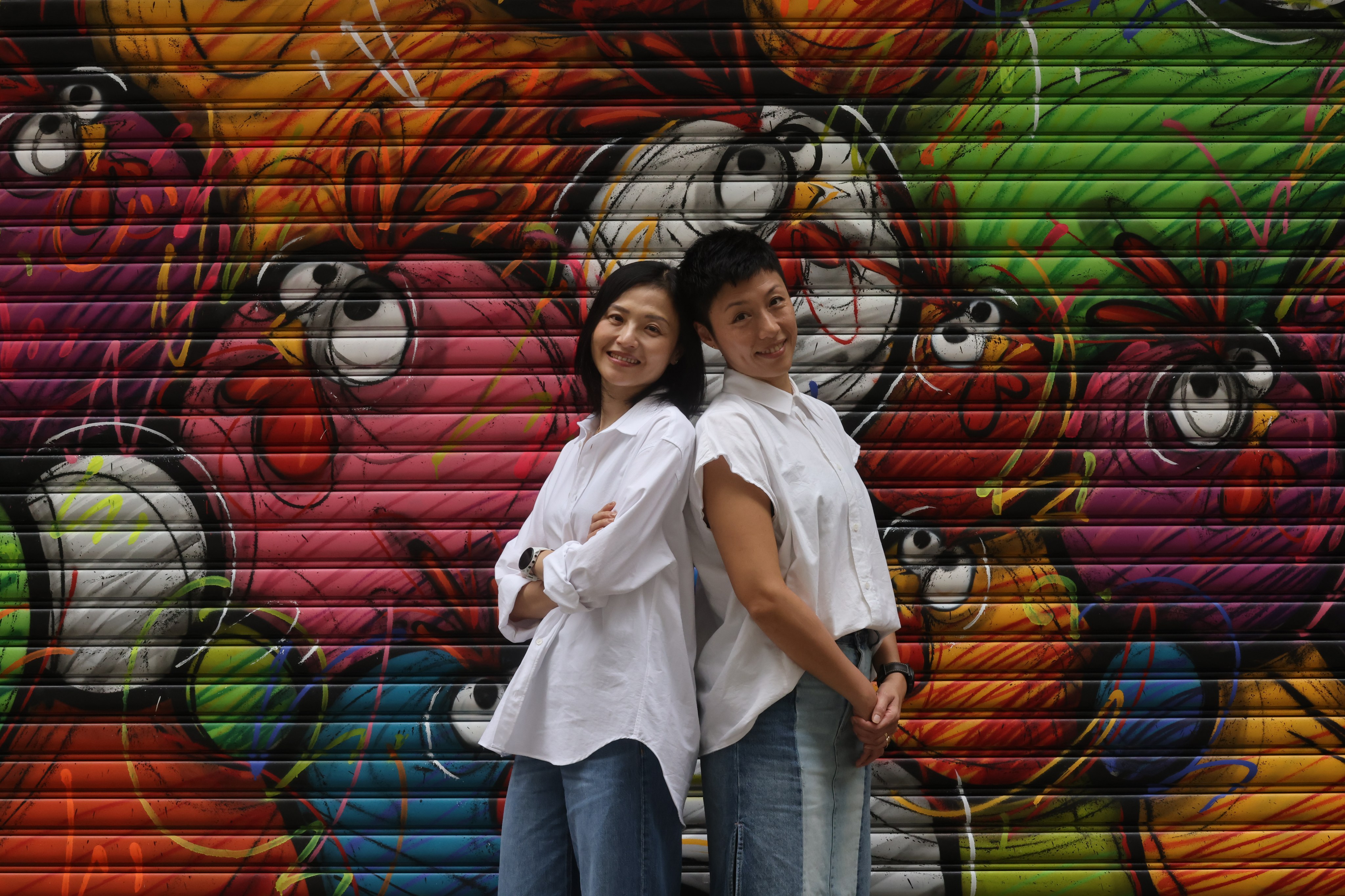 Vivian Ho (left) and Jamie Cheung in Sheung Wan, Hong Kong. They endured cancer together during the pandemic, and their journey highlights the importance of support for cancer patients during global health emergencies. Photo: Jonathan Wong