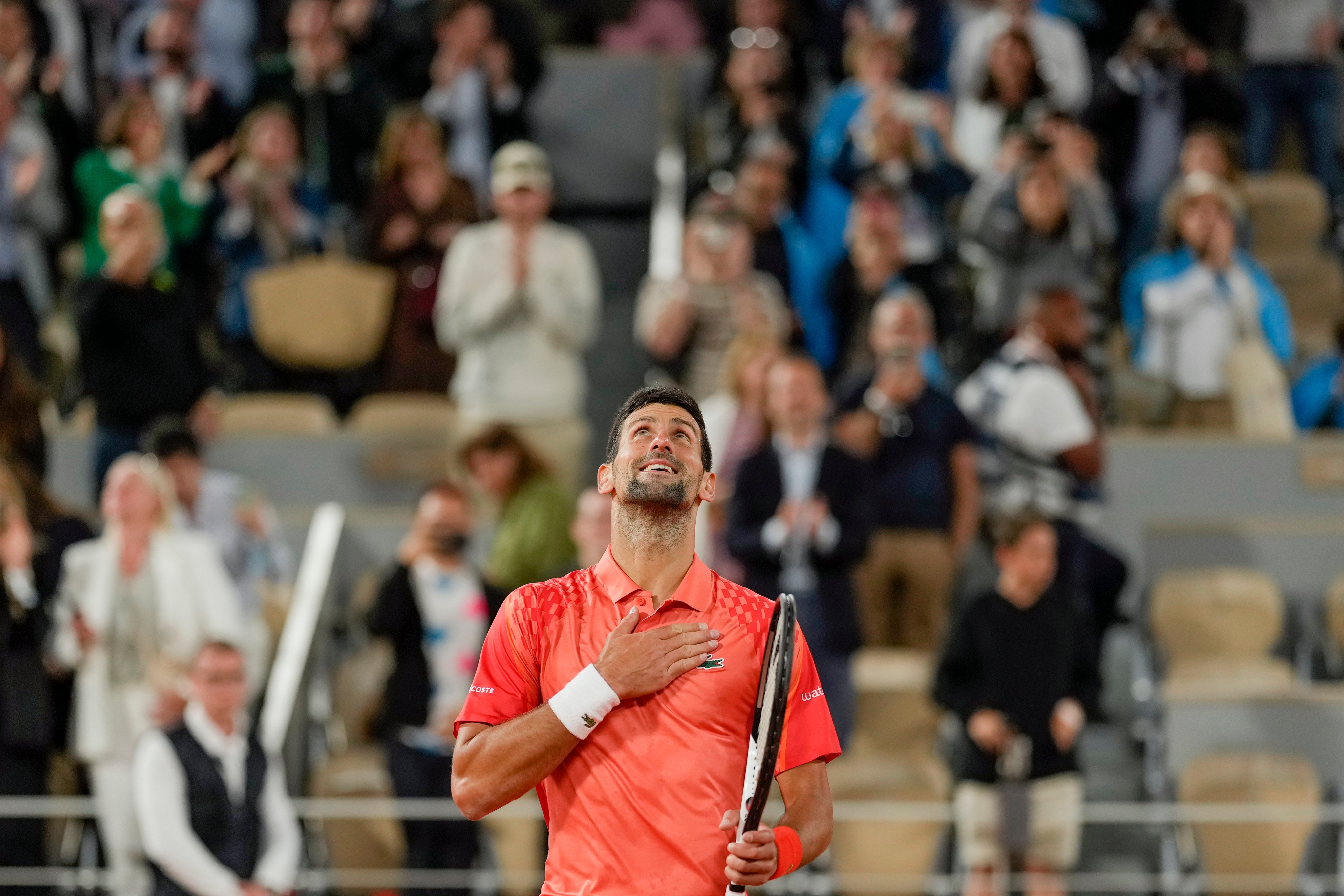 Novak Djokovic celebrates after beating Marton Fucsovics in the second round of the French Open. Photo: AP