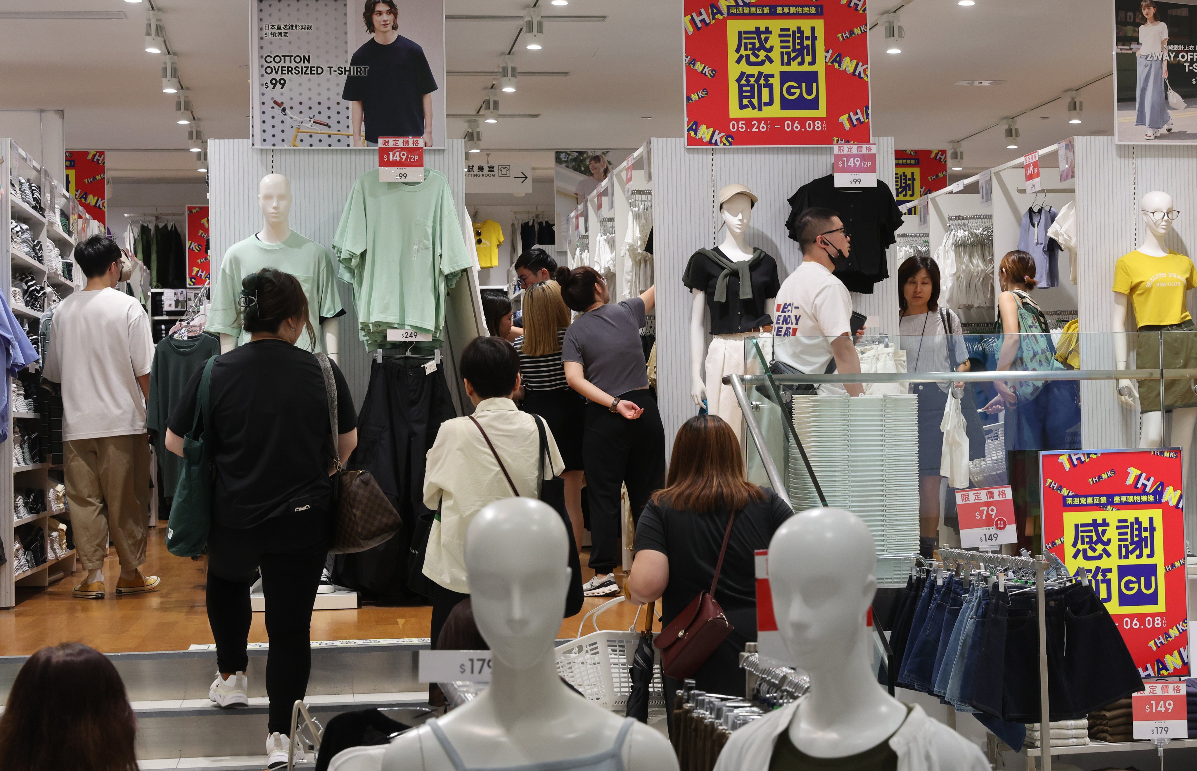 Retail is on the rebound and the e-voucher scheme will boost takings, Chief Executive John Lee has told an industry summit. Photo: Yik Yeung-man