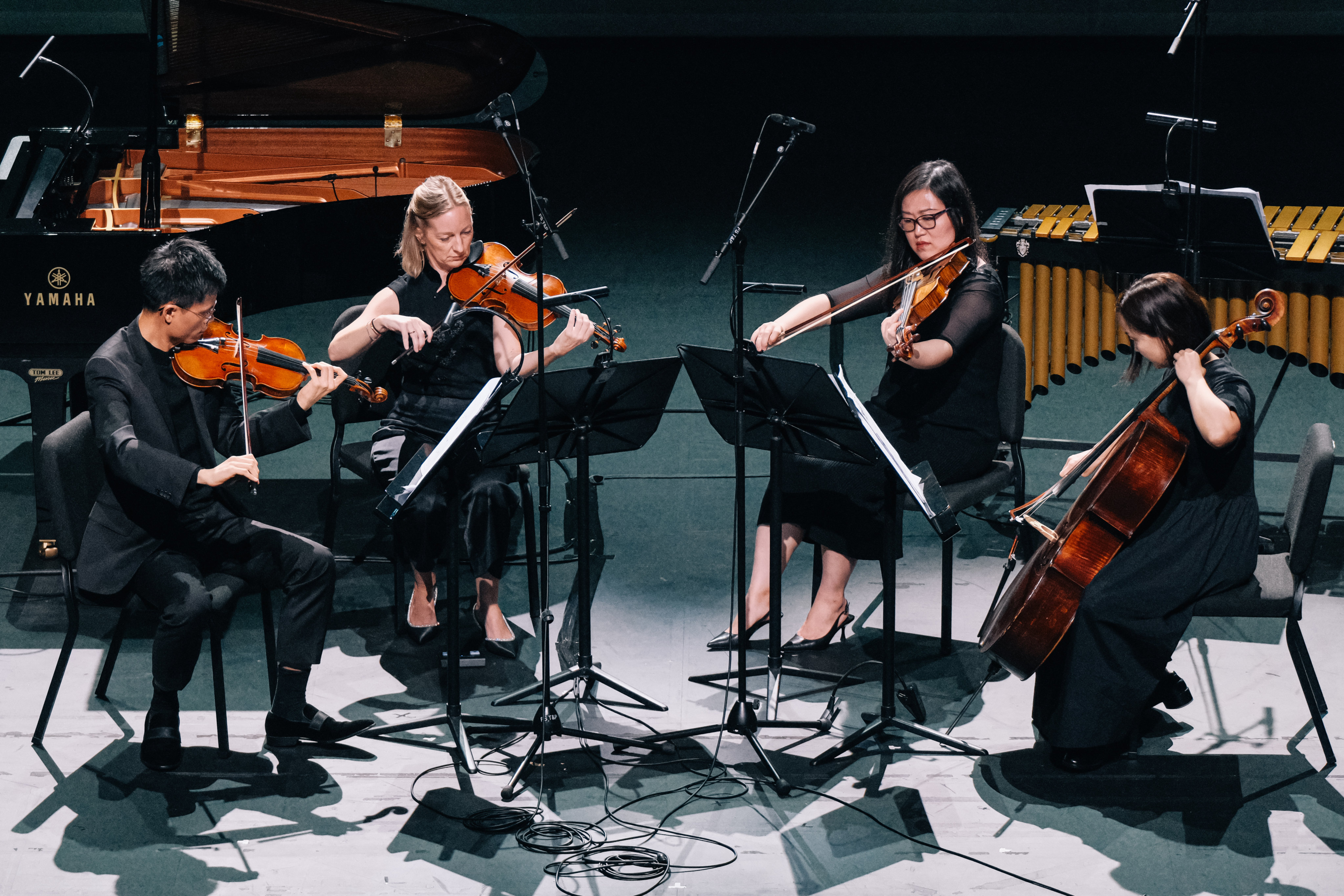 From left to right, Li Chi and Katrina Rafferty on the violin, Zhang Shuying on the viola and cellist Song Tae-mi Song performing in “The Wind with a Voice”. Photo: Ka Lam/HK Phil