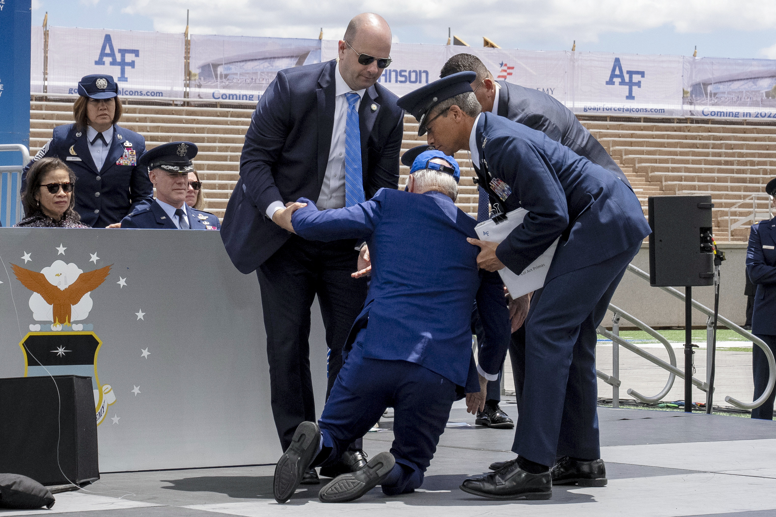 US President Joe Biden falls on stage during the United States Air Force Academy graduation ceremony at Falcon Stadium in Colorado Springs on Thursday. Photo: AP