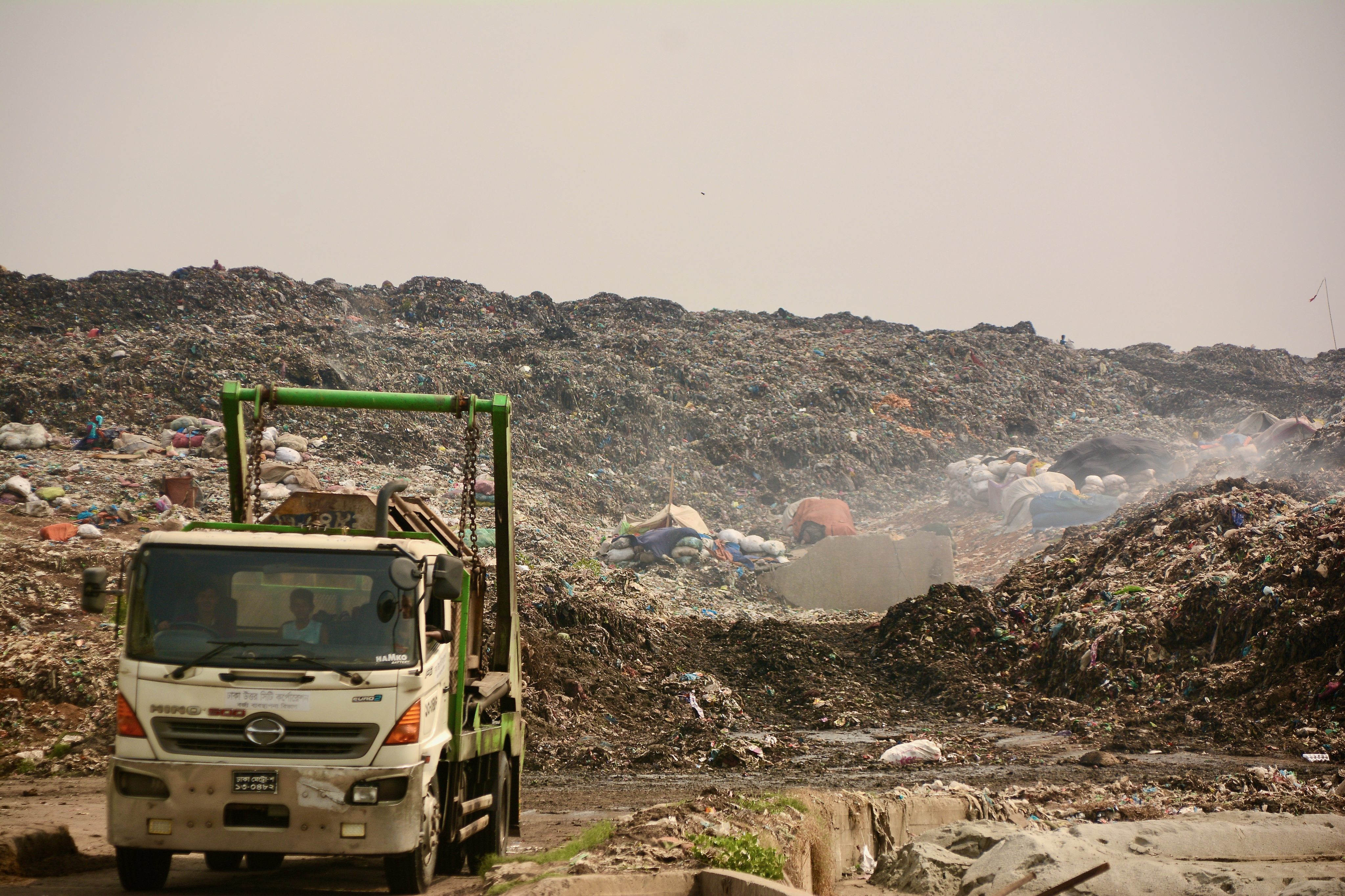 A trash truck leaves the Aminbazar landfill site on the outskirt of Dhaka. Photo: Redwan Ahmed