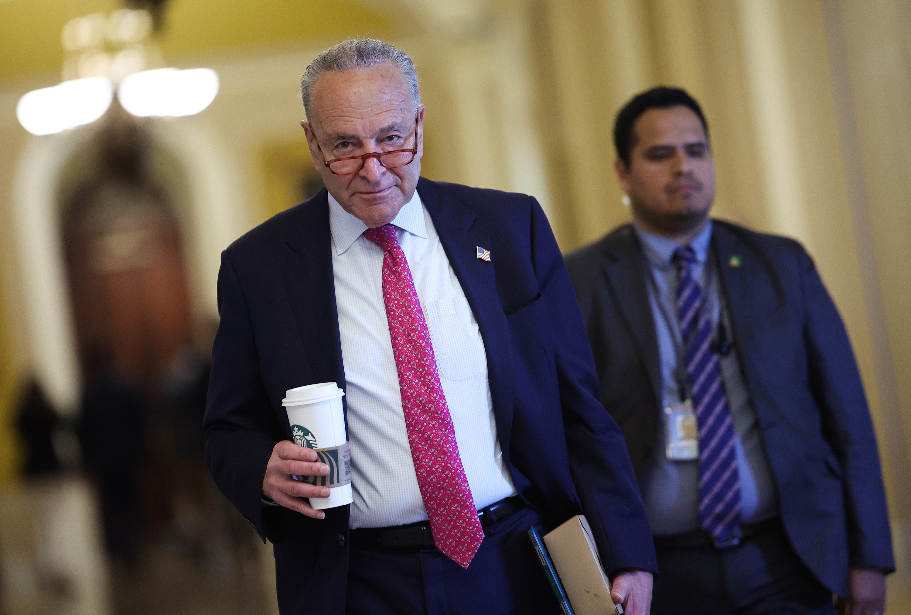 US Senate Majority Leader Charles Schumer walks to his office on Thursday. Photo: TNS