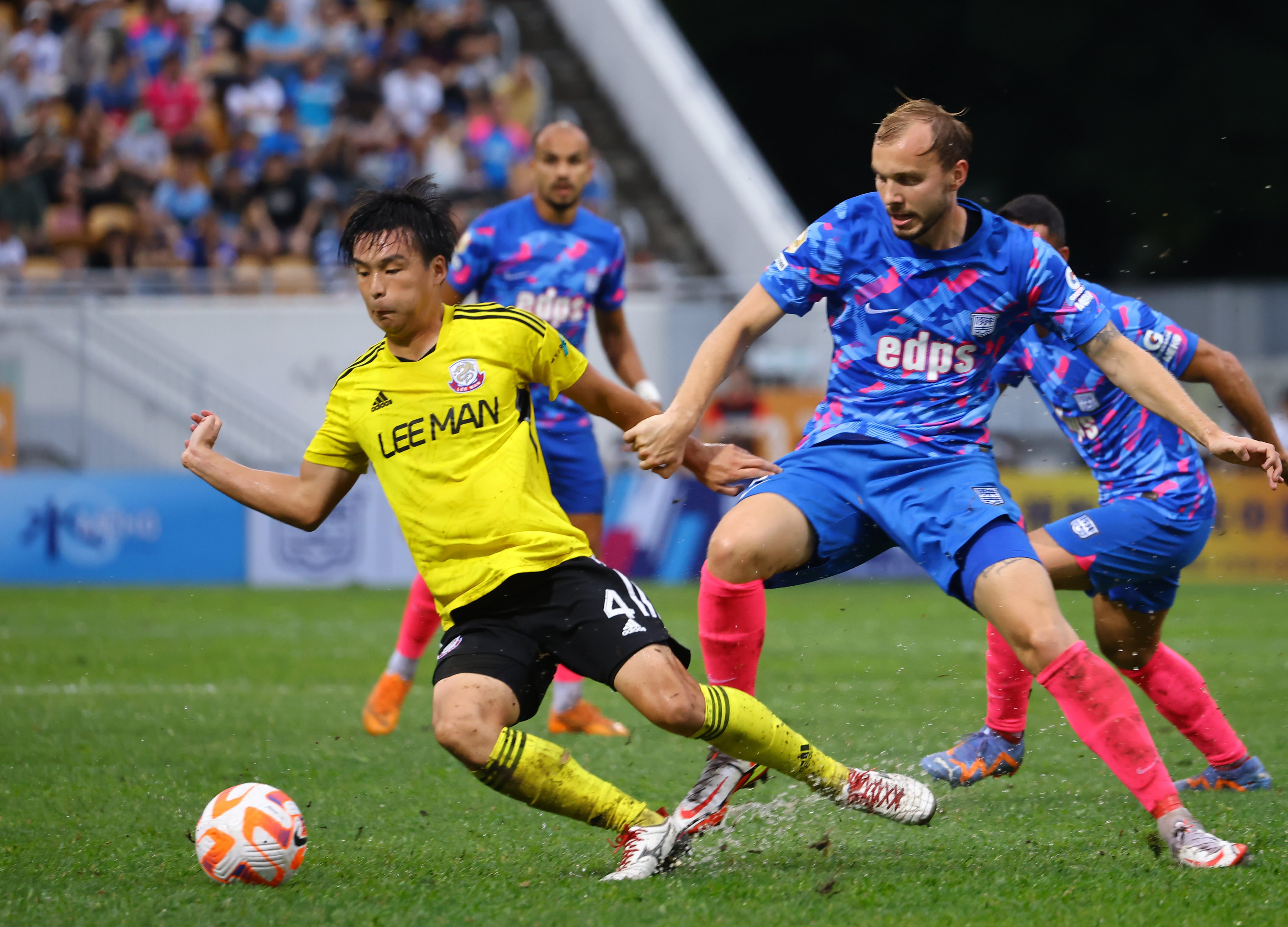 Lee Man (yellow) and Kitchee meet in the Hong Kong Premier League decider last month, but their FA is not targeting success on the mainland. Photo: Dickson Lee