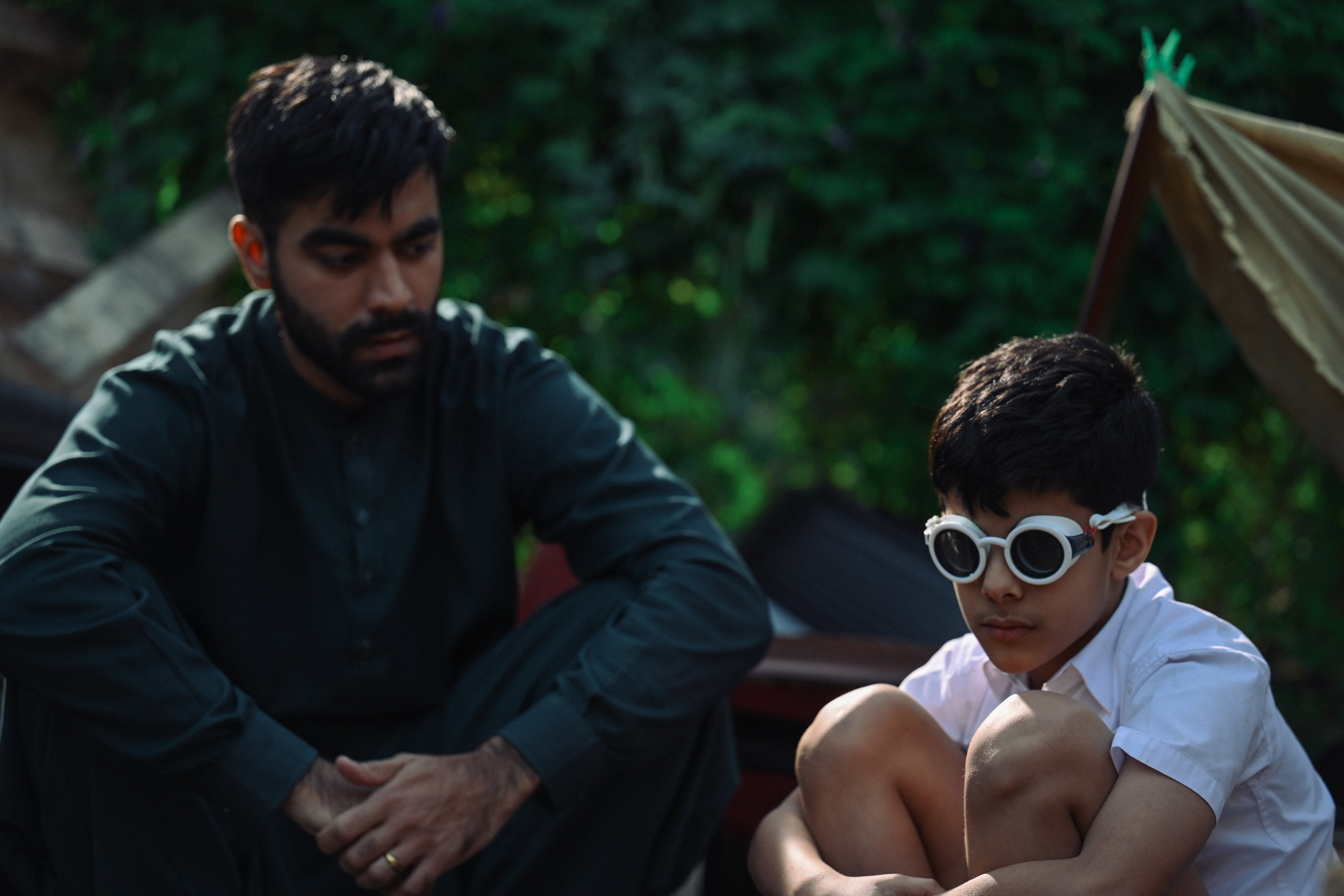 Inderjeet Singh (left) and Sahal Zaman in a still from The Sunny Side of the Street, a film about a Hong Kong taxi driver and a young refugee boy he meets. Image: Petra Films