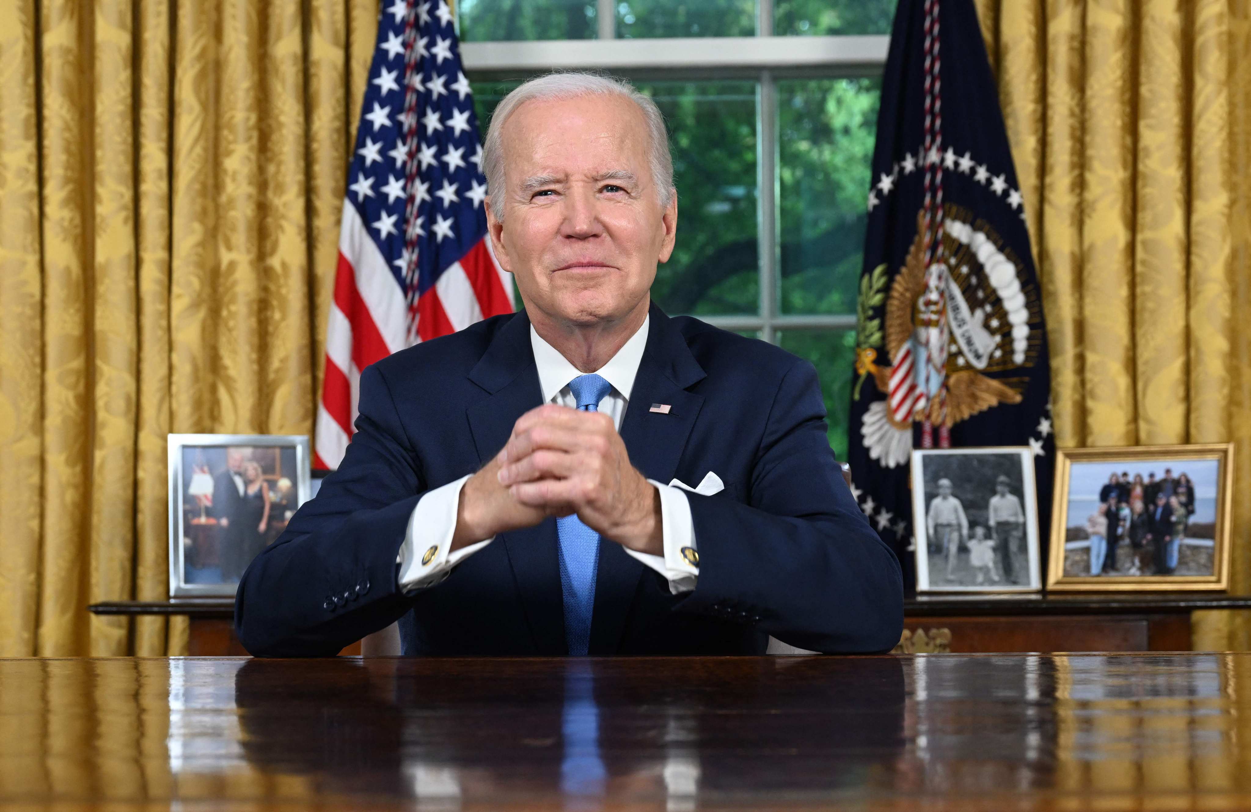 US President Joe Biden addresses the nation from the Oval Office of the White House on Friday. Photo: AFP