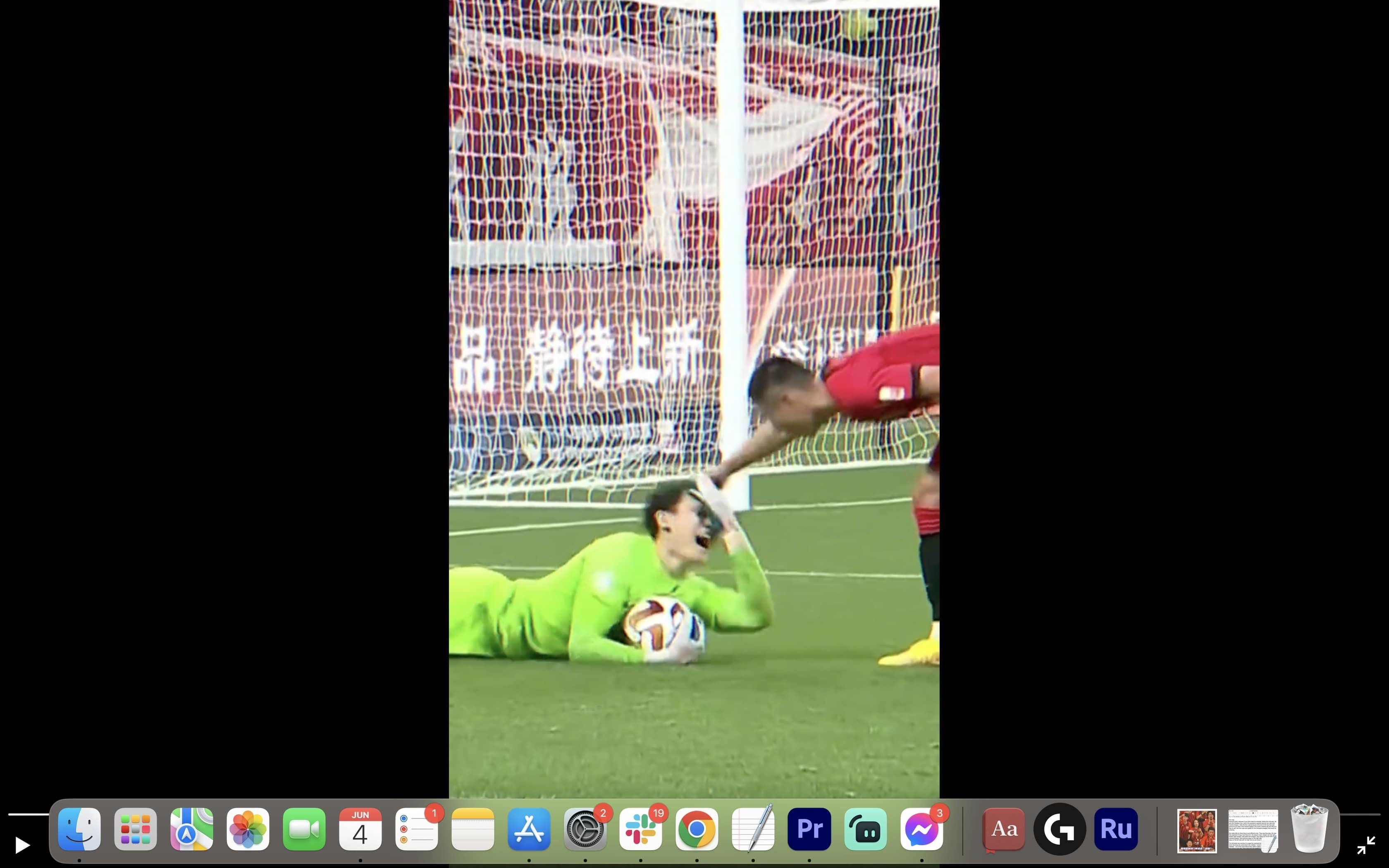 Wu Lei ruffles Zhang Yan’s hair with the goalkeeper appearing to feign injury. Twitter/@FourFiveWonton
