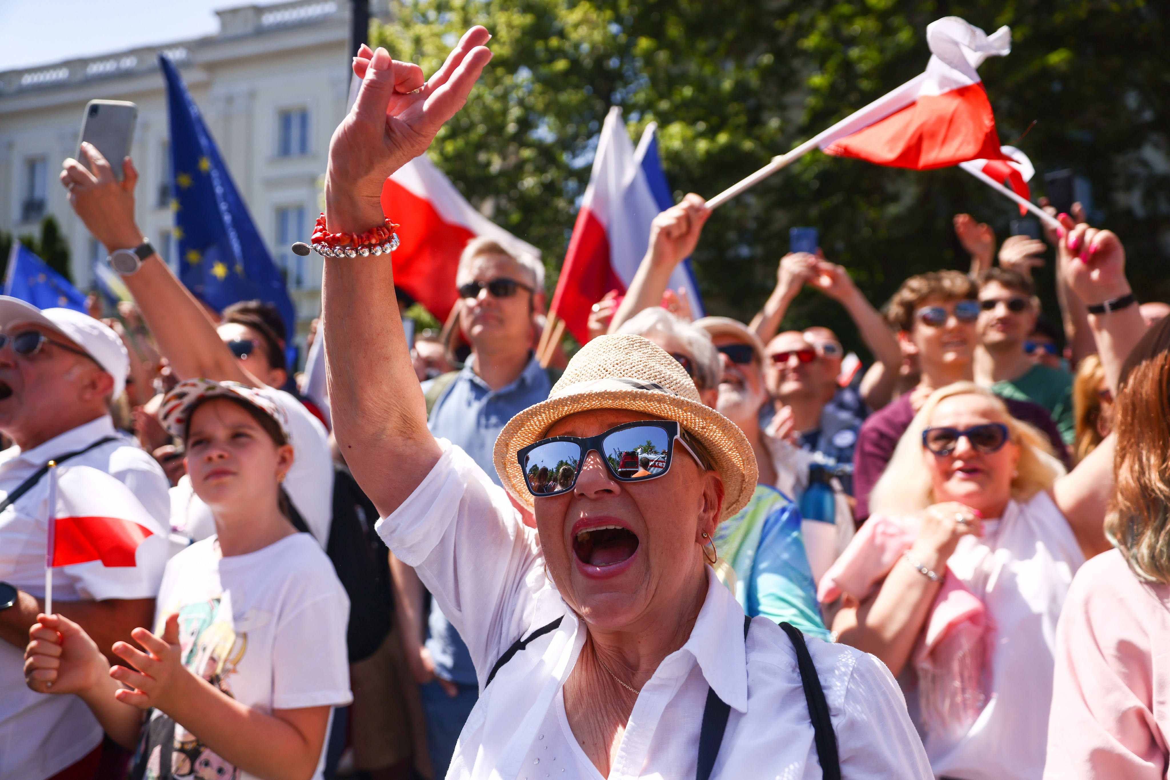 People attend an anti-government march on the 34th anniversary of Poland’s first postwar democratic election, in Warsaw, Poland on Sunday. Photo: Zuma Press Wire / dpa