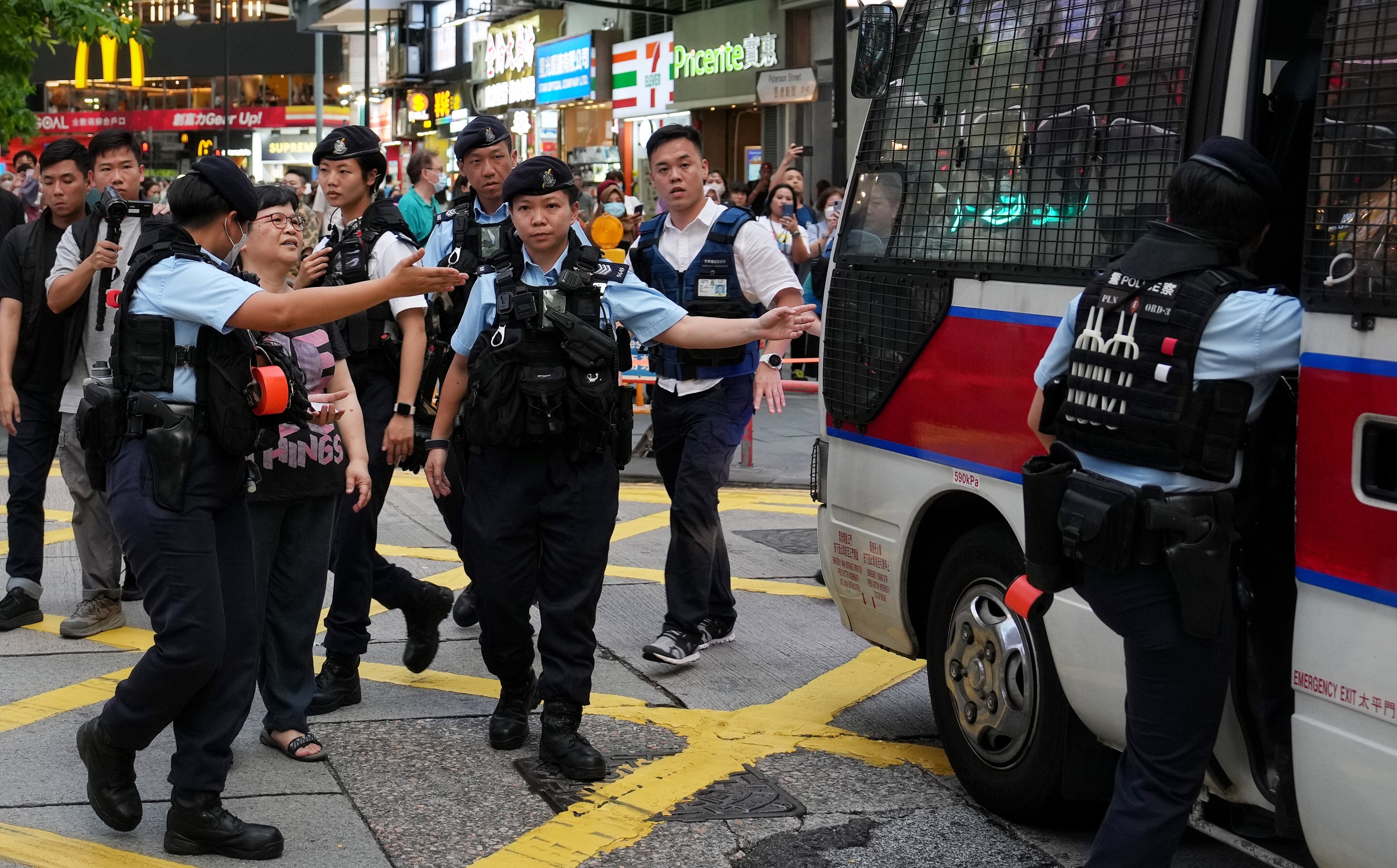 Mak Yin-ting, a veteran journalist and former chairwoman of the Hong Kong Journalists Association, is taken to a police van after she was detained in Causeway Bay, near the traditional site of the Tiananmen Square June 4 crackdown commemoration. Photo: Elson Li