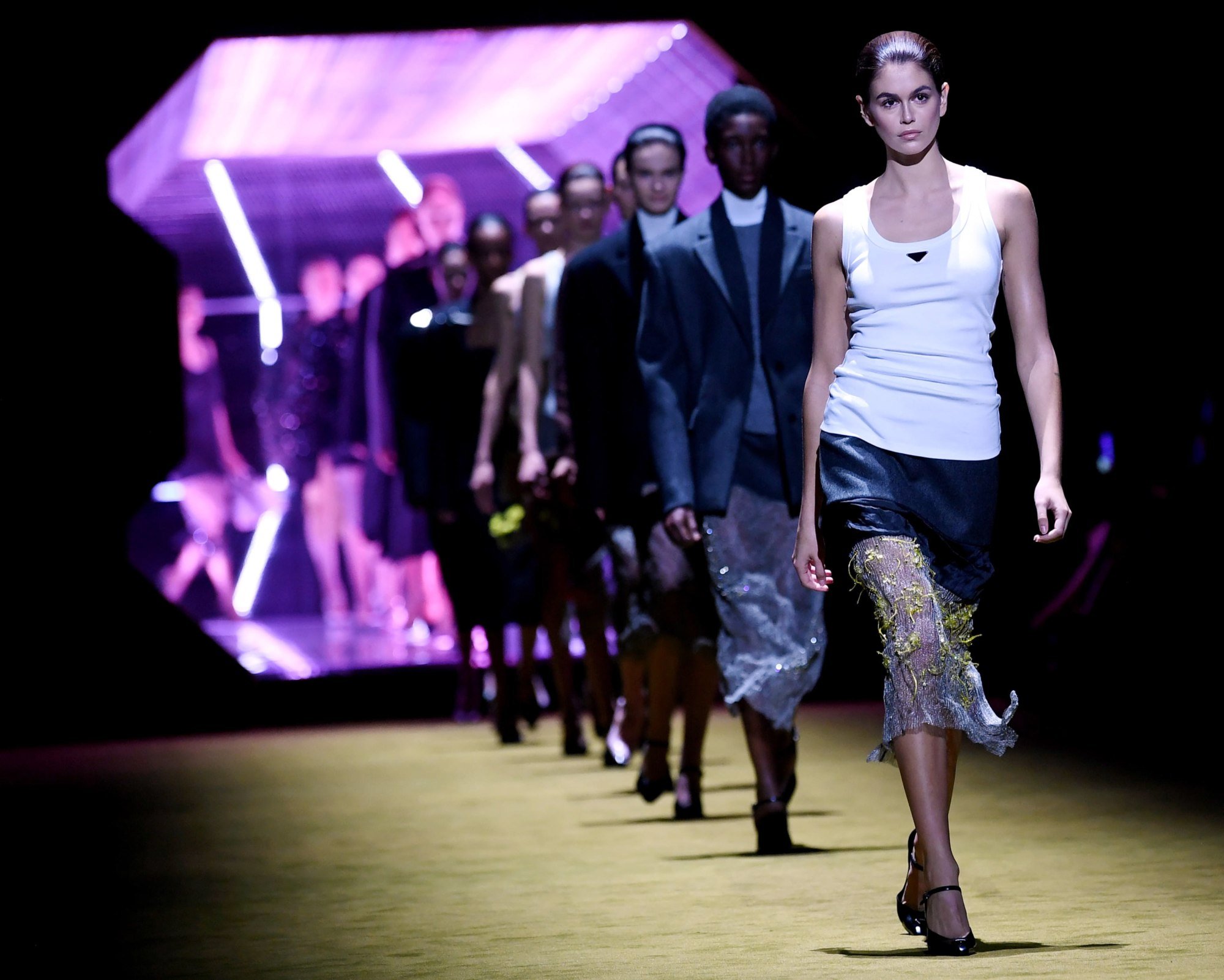 US model Kaia Gerber (right) and other models present creations by Italian brand Prada during the Milan Women’s Fashion Week, in Milan, Italy, in February 2022. Photo: EPA-EFE