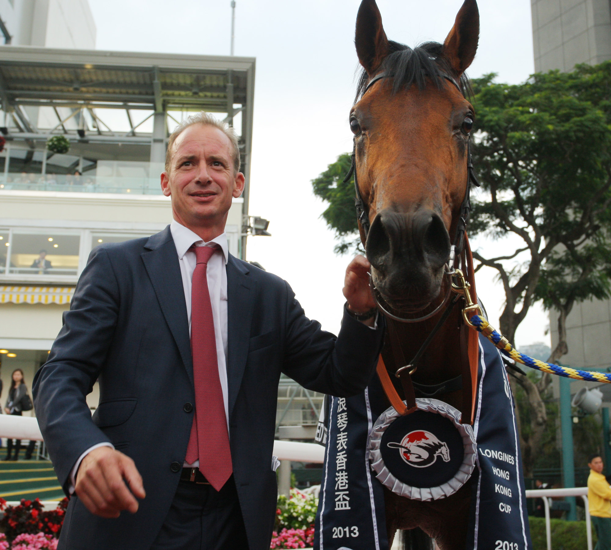Richard Gibson with Akeed Mofeed after their victory in the 2013 Hong Kong Cup.