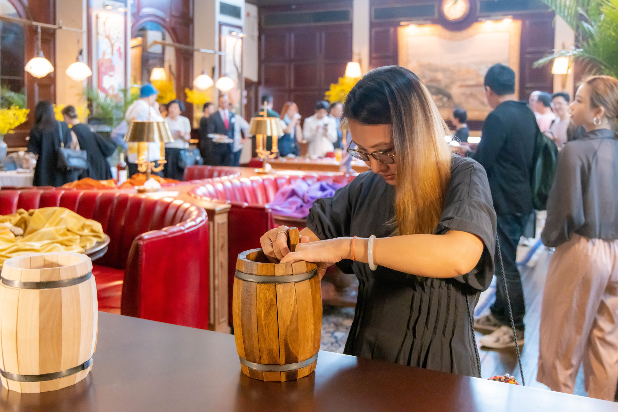 Guests engaged in mini cask-making activities at the tasting event at Tai Kwun, to learn more about the traditional craftsmanship behind The Macallan. Photo: The Macallan