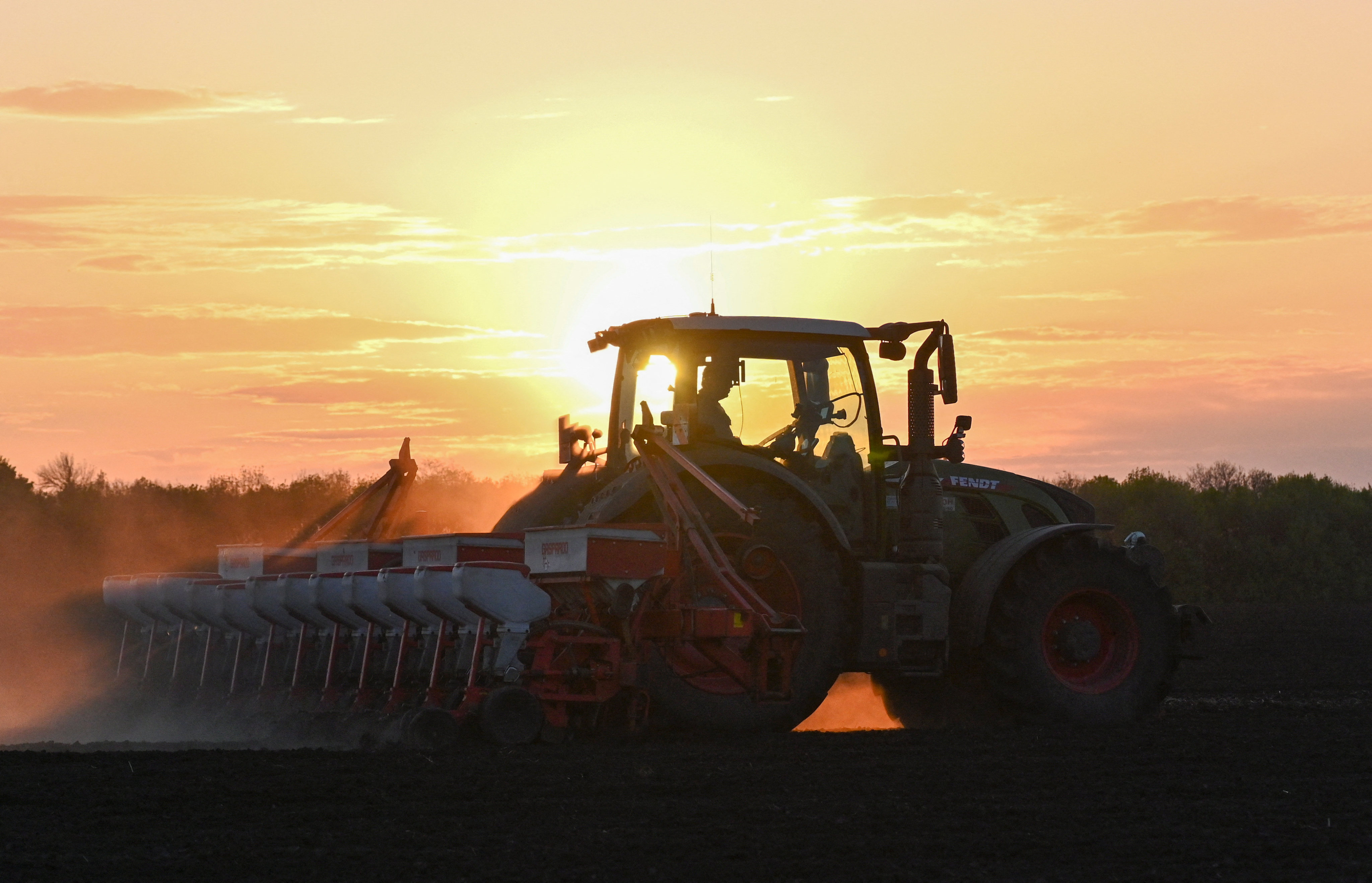 A farmer sows corn seeds at sunset near the village of Chaltyr in the Rostov region of Russia. China sees Russia and Central Asia as potentially important sources of food imports as it tries to solidify its food security supply chains. Photo: Reuters