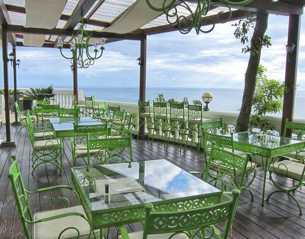 Government payouts, supposed to fight climate change, have been given to hotels, chocolate and gelato stores, a romantic film, and a coal power plant. Pictured: the refurbished Basilik Restaurant at Habitation Jouissant in Haiti, one of the beneficiaries of such payouts. Photo: Habitation Jouissant