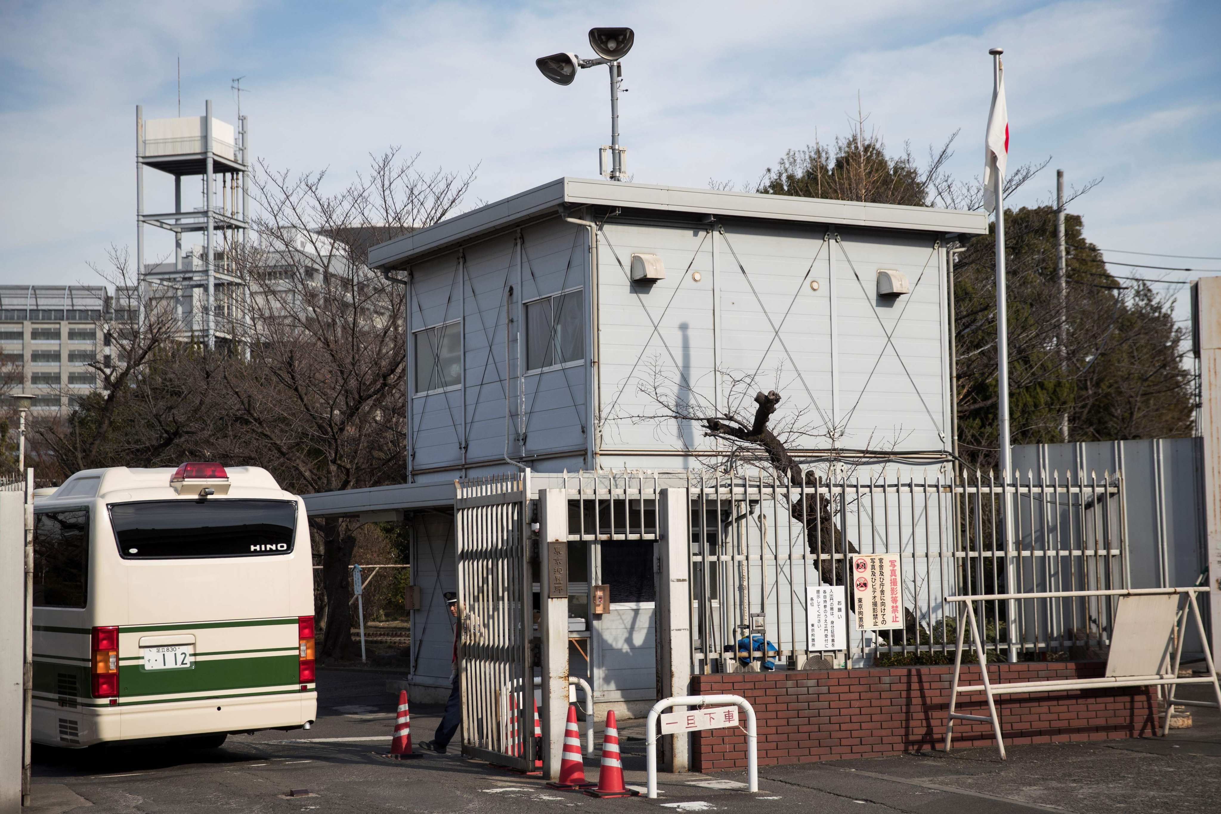 A police bus enters the Tokyo Detention House in Japan. Photo: AFP