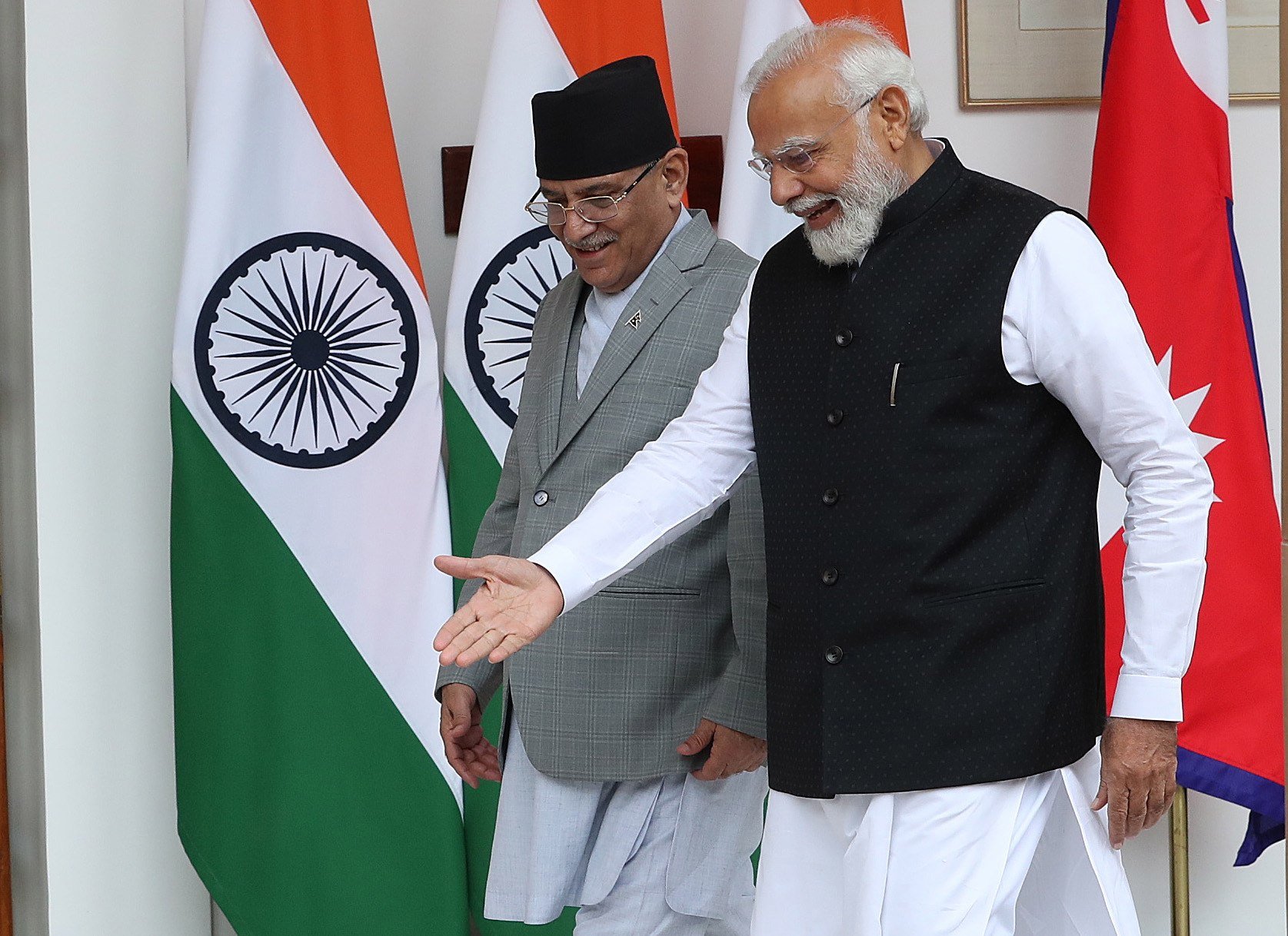 Nepal’s Prime Minister Pushpa Kamal Dahal (left) chats with Indian Prime Minister Narendra Modi prior to their meeting at Hyderabad House, in New Delhi, India, on June 1, 2023. Photo: EPA-EFE