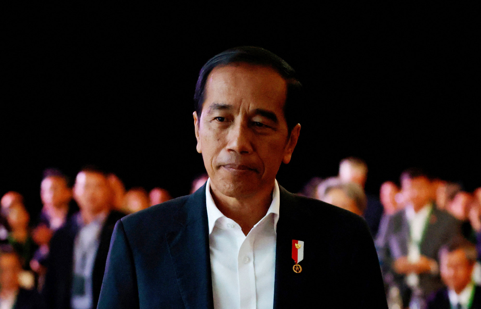 Indonesia’s President Joko Widodo takes the stage to speak about the planned new capital Nusantara, at conference in Singapore. Photo: Reuters
