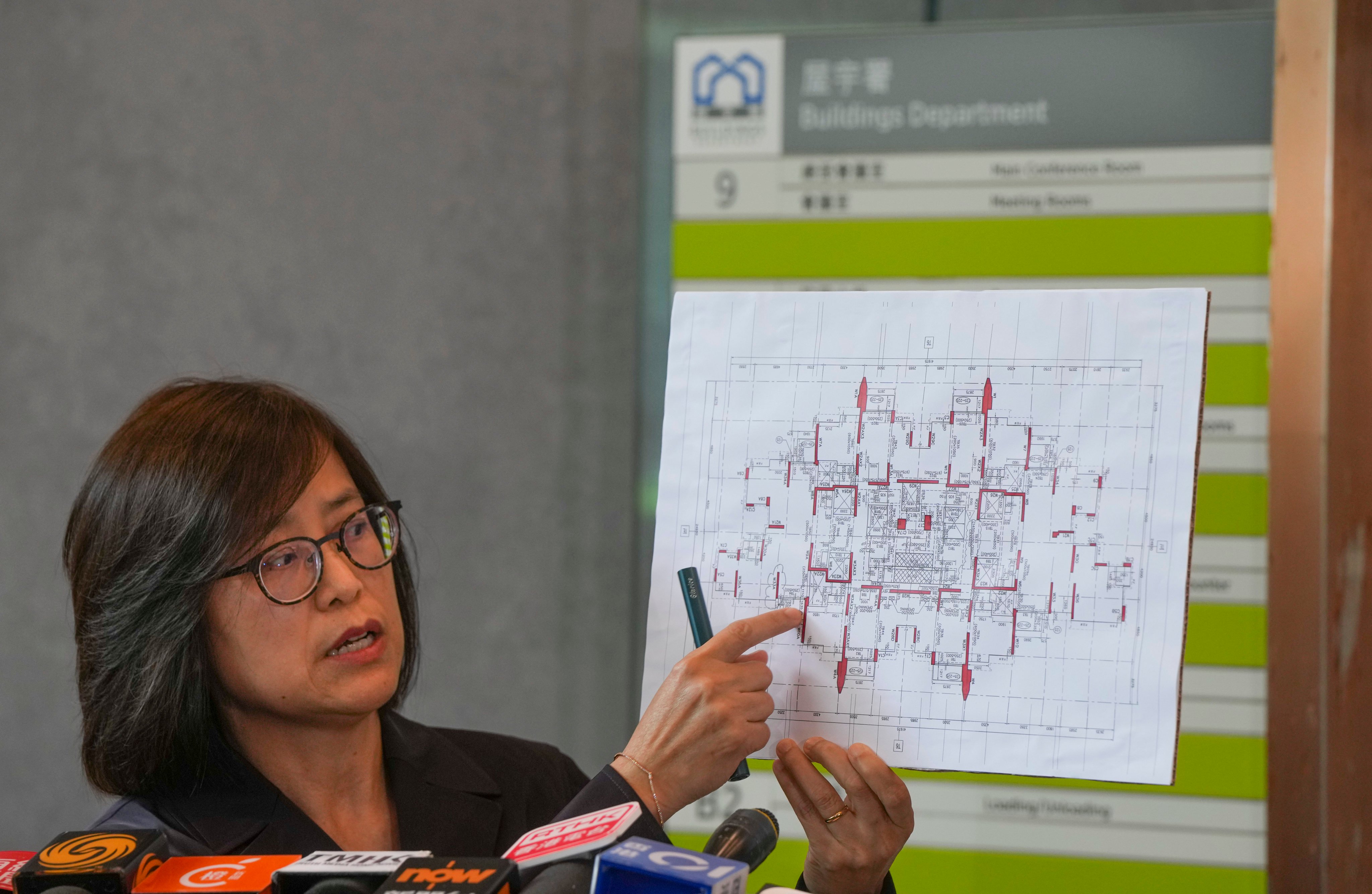 Director of Buildings Clarice Yu Po-mei meets the media at the Buildings Department headquarters in Yau Ma Tei to discuss investigations into the partial removal of a structural wall in a flat at The Capitol, Lohas Park, in Tseung Kwan O, on May 30. Photo: Sam Tsang
