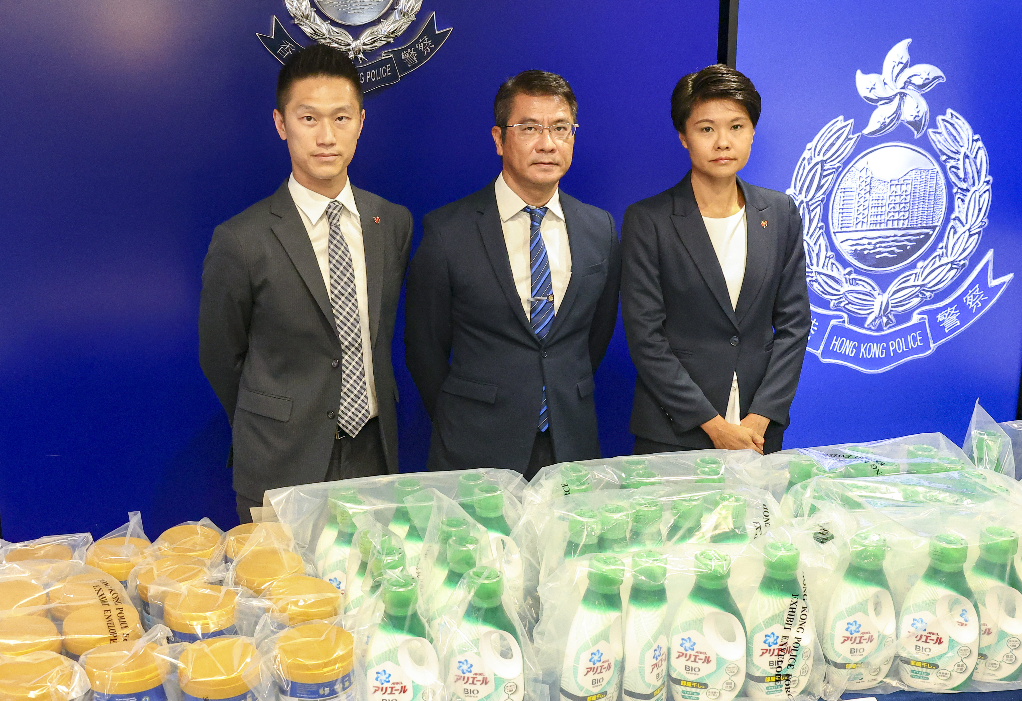 Chief Inspector Or Wing-yan (left), Superintendent Rick Chan and Senior Inspector Mak Wai-kwong display goods seized during the operation. Photo: Dickson Lee