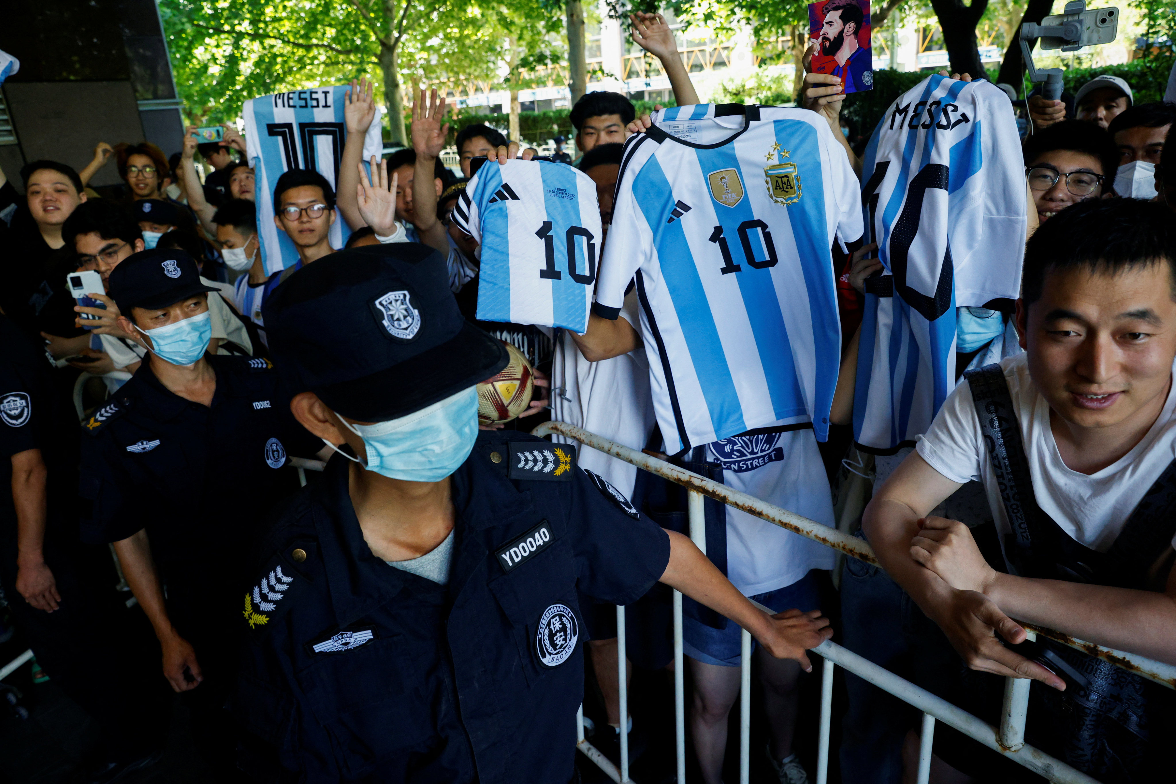 Chinese fans of Argentina’s Lionel Messi wait for his arrival at a hotel in Beijing. Photo: Reuters