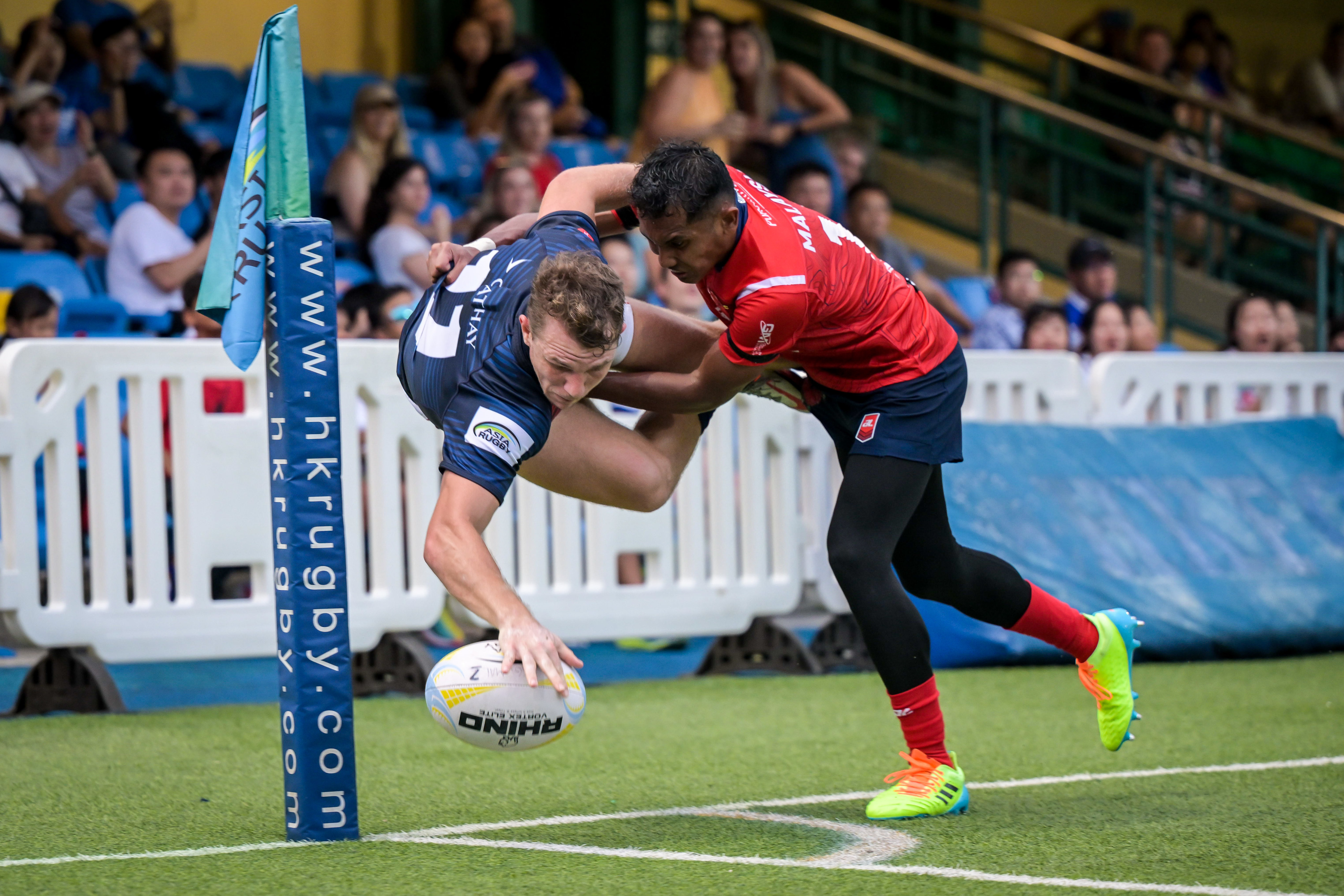 Hong Kong’s Seb Brien scores in the corner during his side’s 88-9 victory over Malaysia in their Asia Rugby Championship clash at Hong Kong Football Club. Photo: HKRU