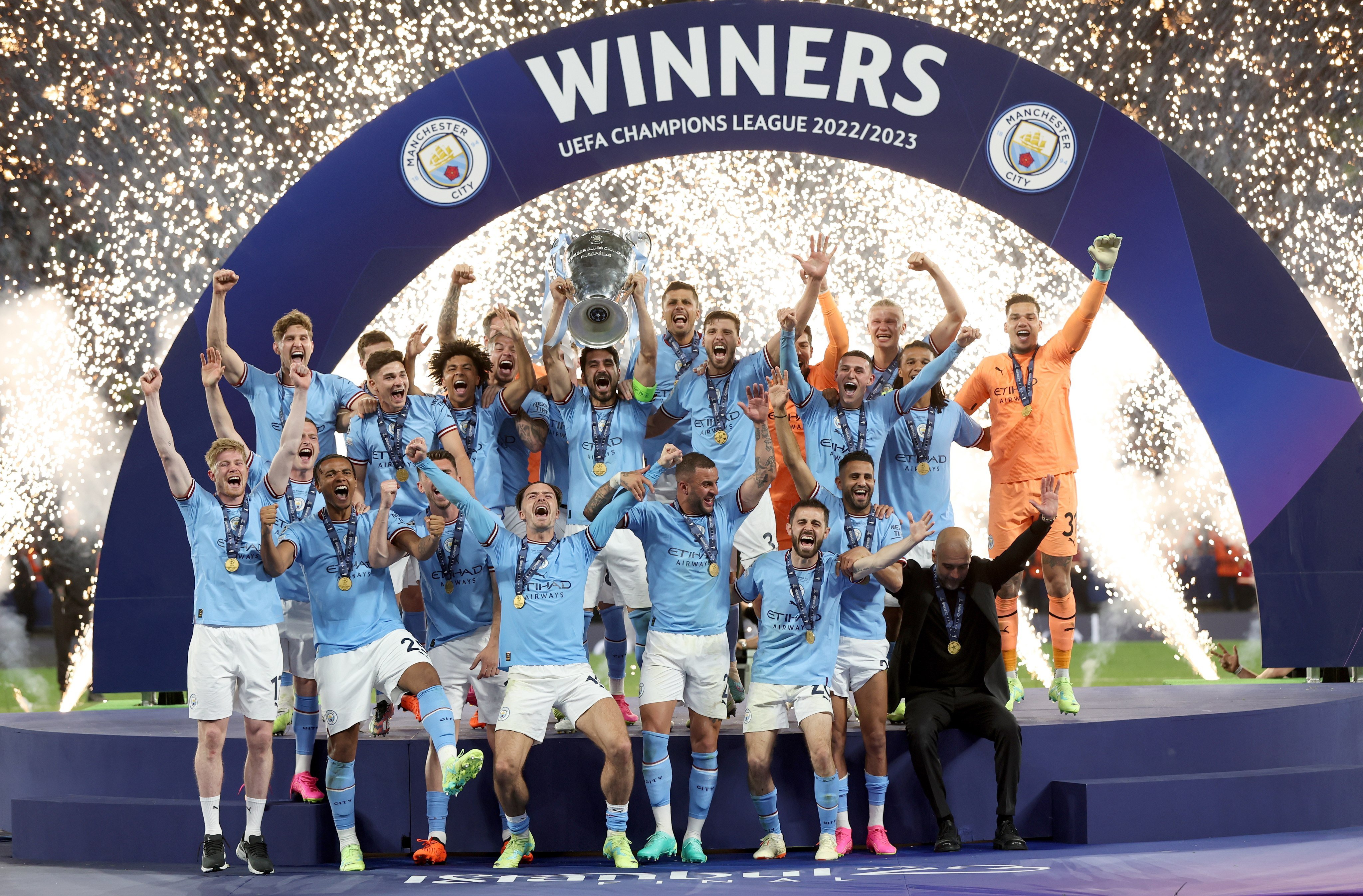 Manchester City captain Ilkay Gundogan raises the trophy after his club’s Champions League triumph. Photo: EPA-EFE