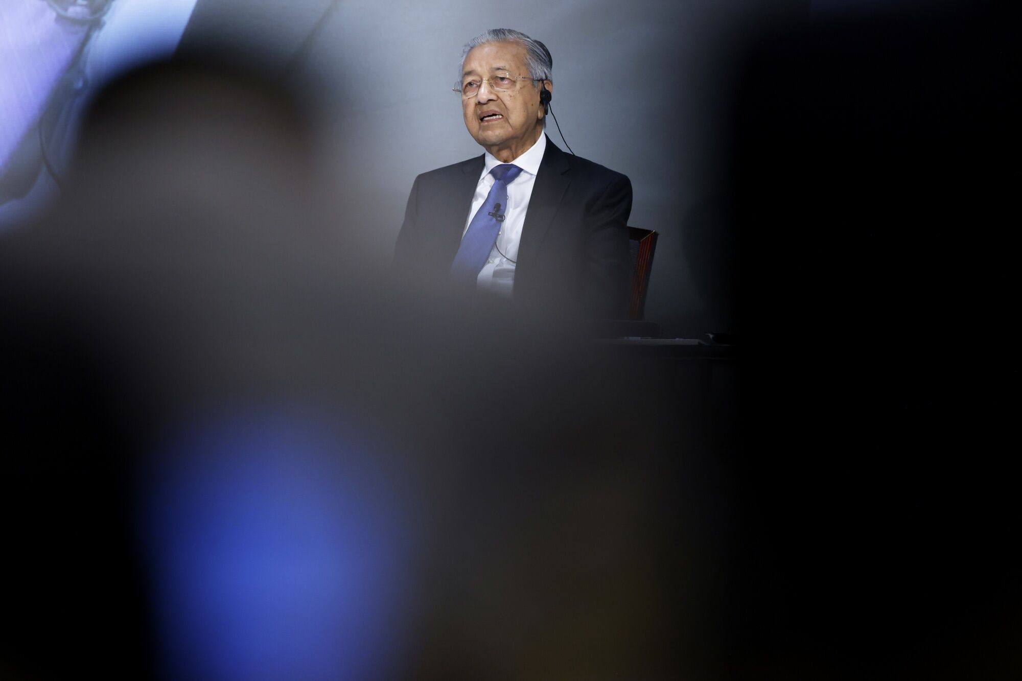 Malaysia’s former prime minister Mahathir speaks during an event in Tokyo, Japan on May 26. Mahathir was questioned by police for allegedly insulting royalty. Photo: Bloomberg