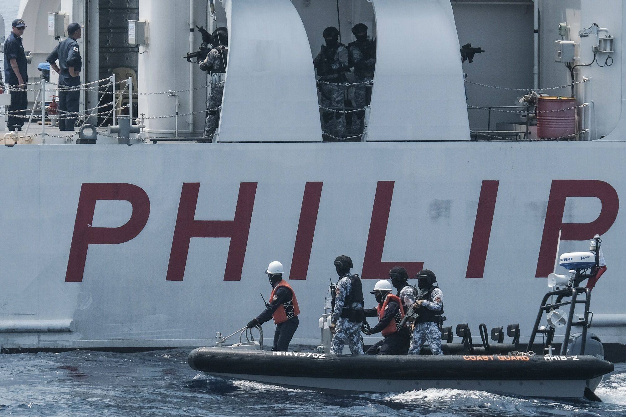 Members of the Philippine Coast Guard take part in a joint maritime exercise with coastguards from Japan and the US off the coast of Mariveles, Bataan province, in the Philippines, on June 6. Photo: Bloomberg
