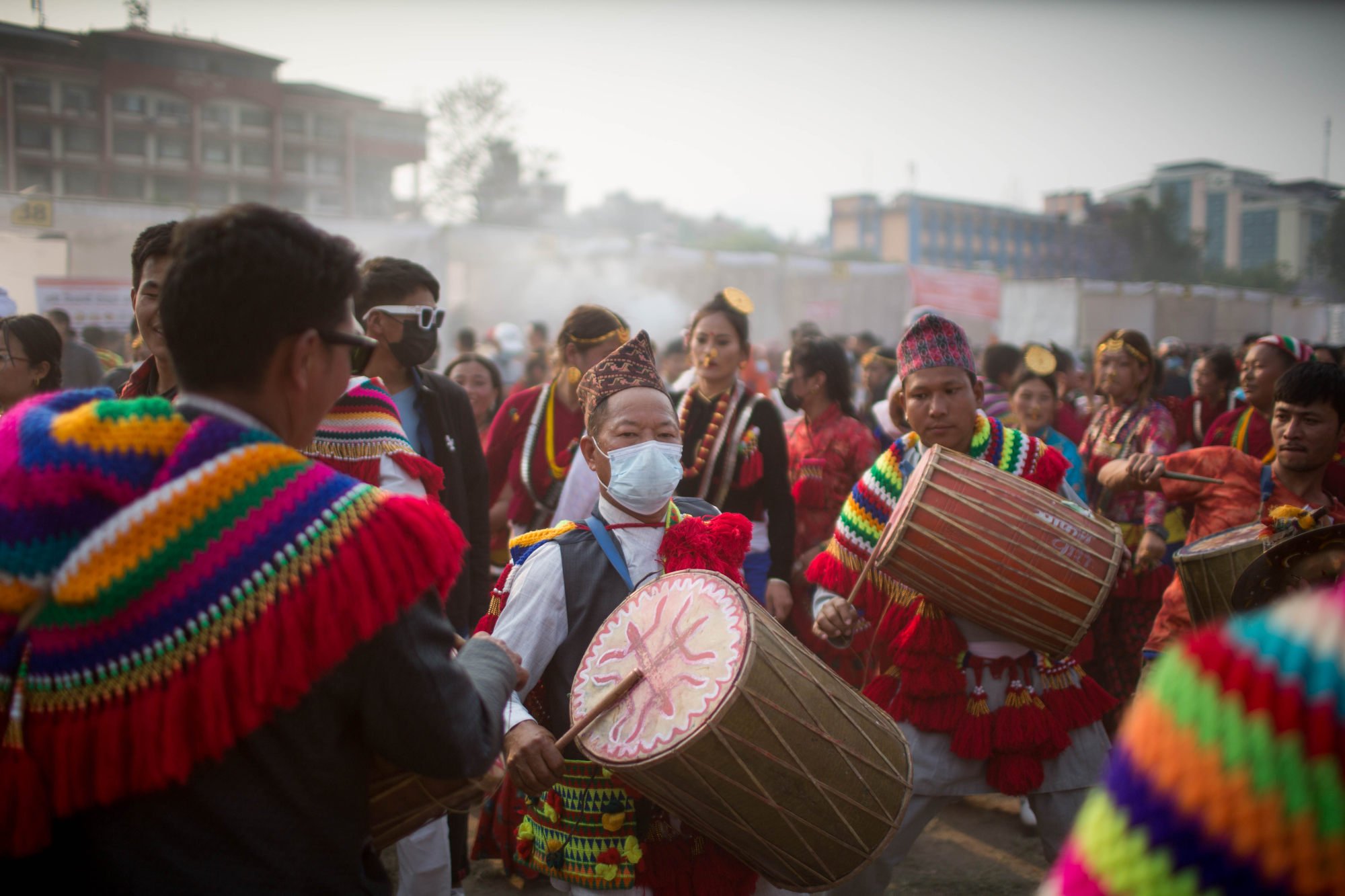People from Nepal’s Kirat community perform a traditional dance during a festival in Kathmandu last month. The average Nepali person is 156.58cm tall. Photo: Xinhua