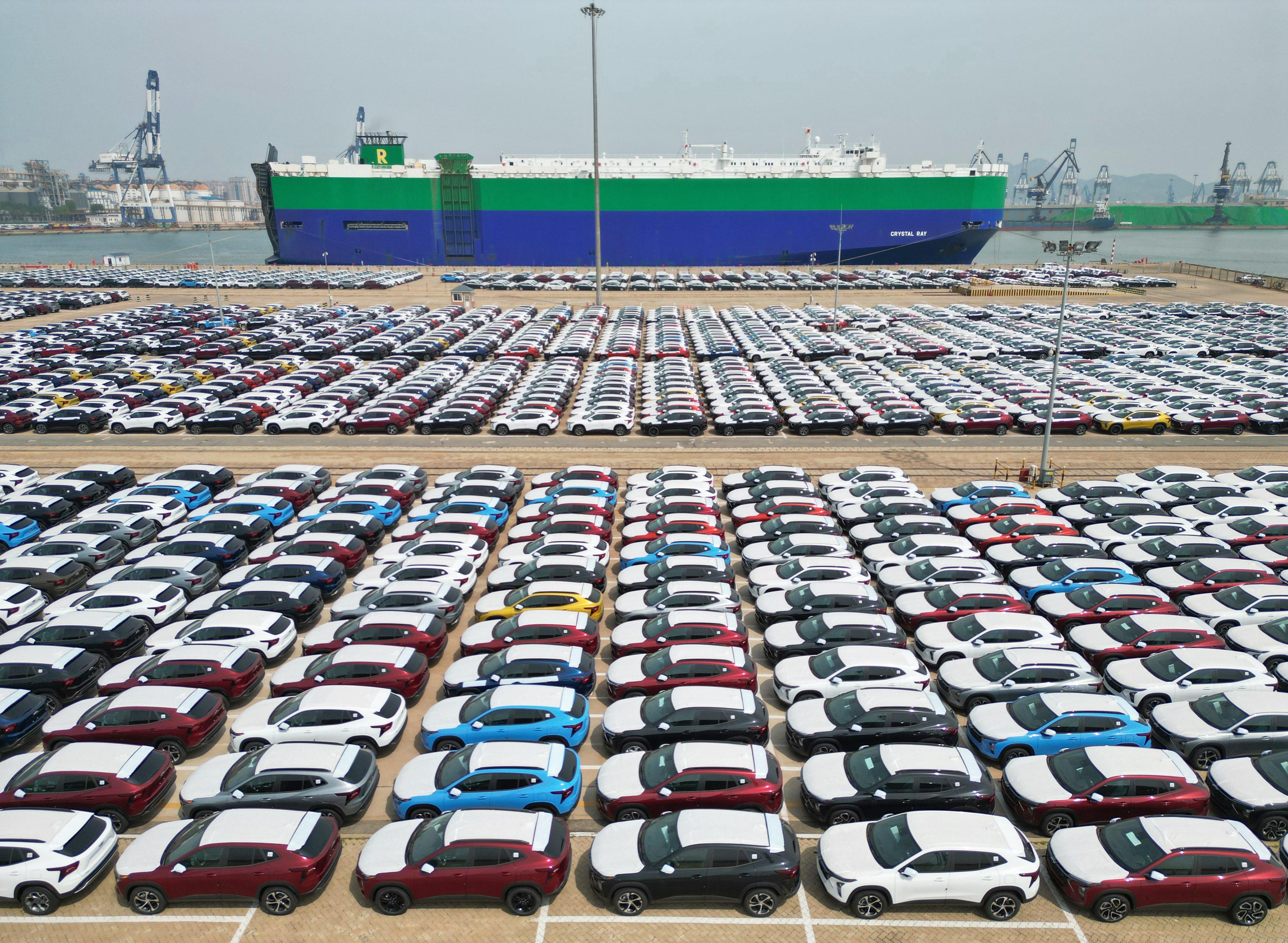 Cars await loading onto a ship for export at Yantai Port in east China’s Shangdong Province on May 9, 2023. Photo: Xinhua
