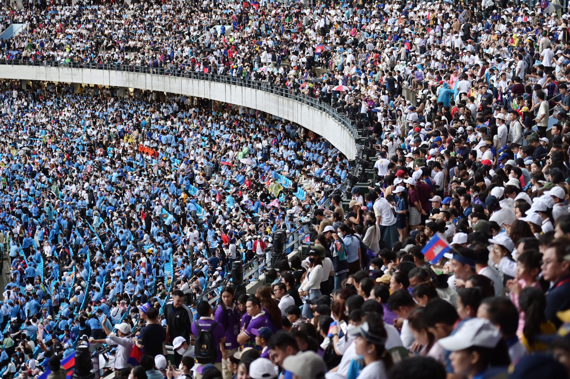 People attend the closing ceremony of the 32nd Southeast Asian Games in Phnom Penh last month. Cambodians are an average of 158.11cm tall. Photo: Xinhua